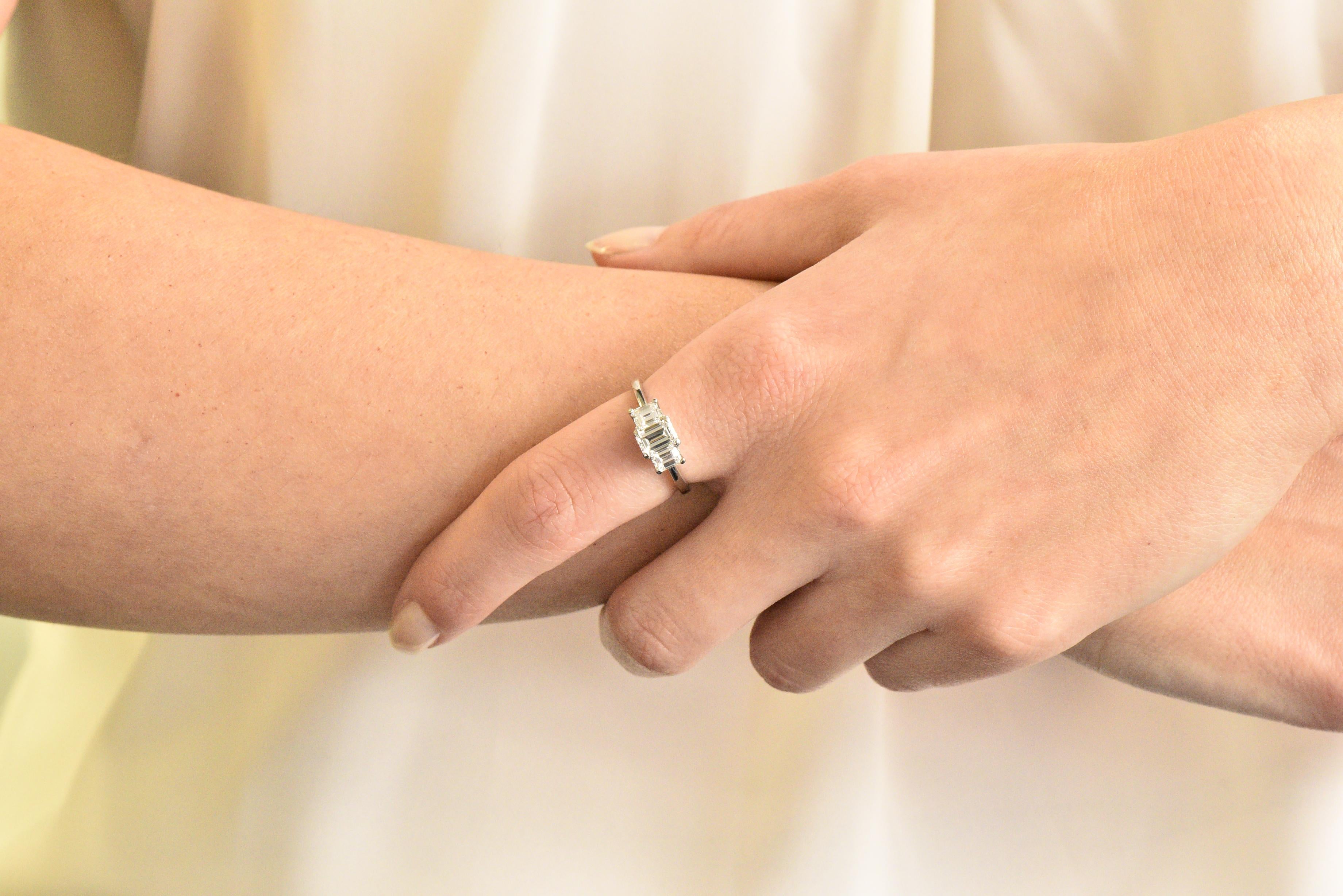 Women's or Men's Vintage 1.40 Carats Emerald Cut Diamond Platinum Three Stone Engagement Ring