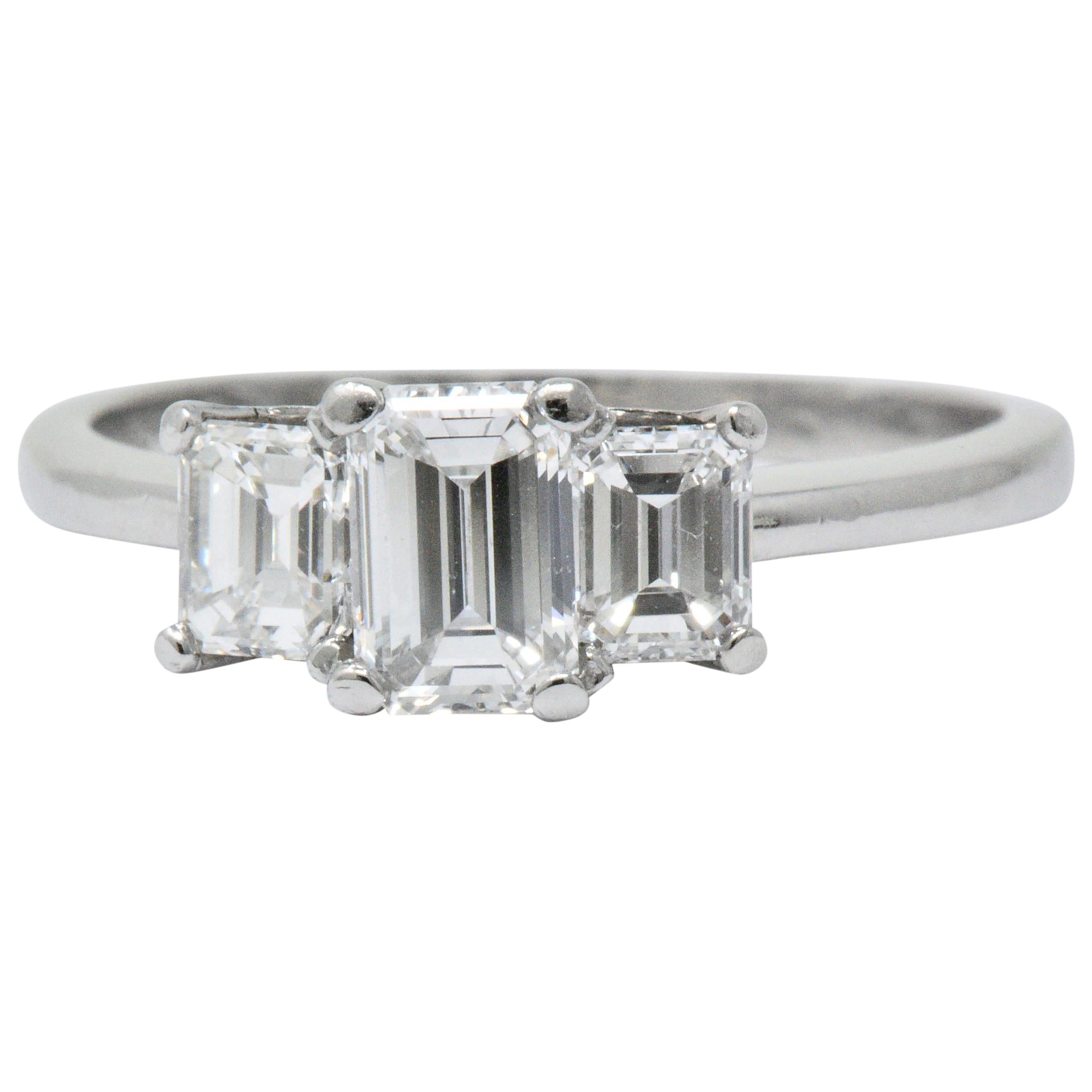 Vintage 1.40 Carats Emerald Cut Diamond Platinum Three Stone Engagement Ring