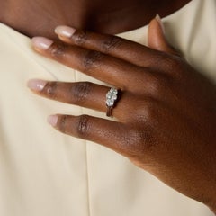 Vintage 1.40 carat oval cut diamond platinum 3 stone ring