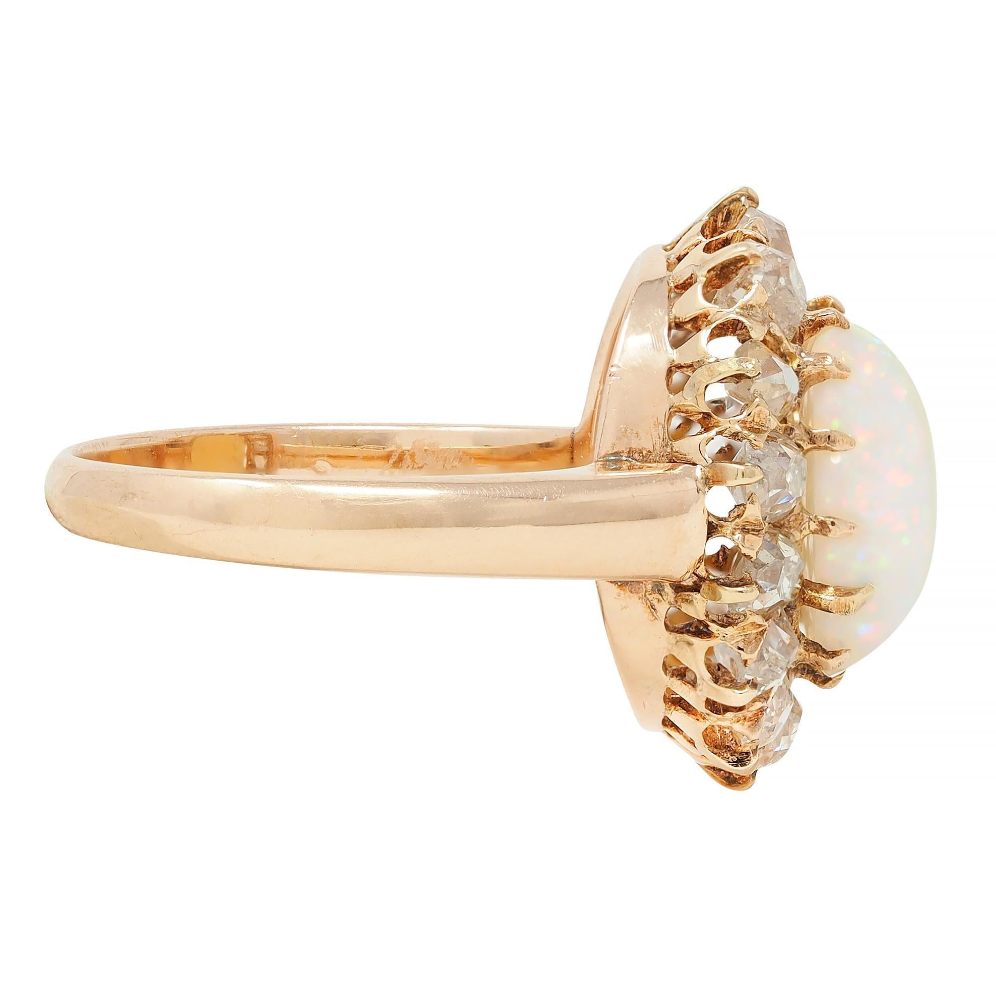Vintage 1.40 CTW Old Mine Diamond Opal 14 Karat Rose Gold Halo Ring In Excellent Condition For Sale In Philadelphia, PA