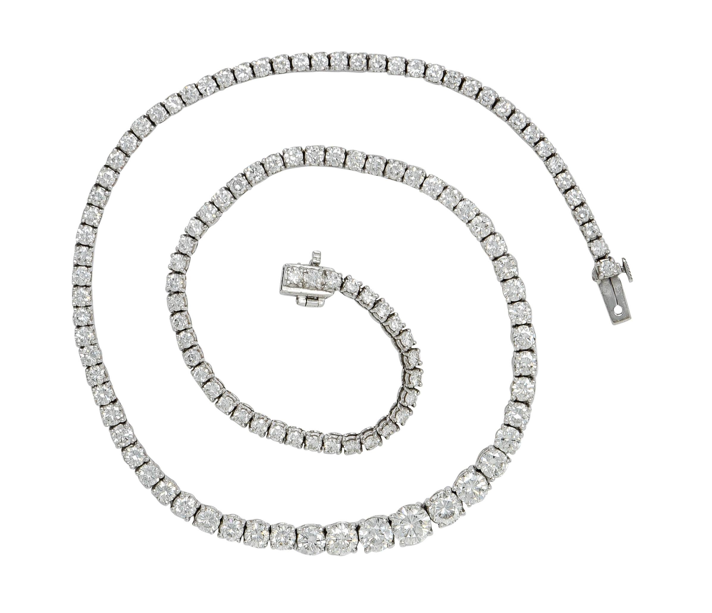 Dazzling riviera style necklace with individual baskets as links

Fully articulated and prong set with round brilliant cut diamonds that graduate in size

Largest central diamonds weighs approximately 0.85 carat; H/I color with VS clarity

Remaining