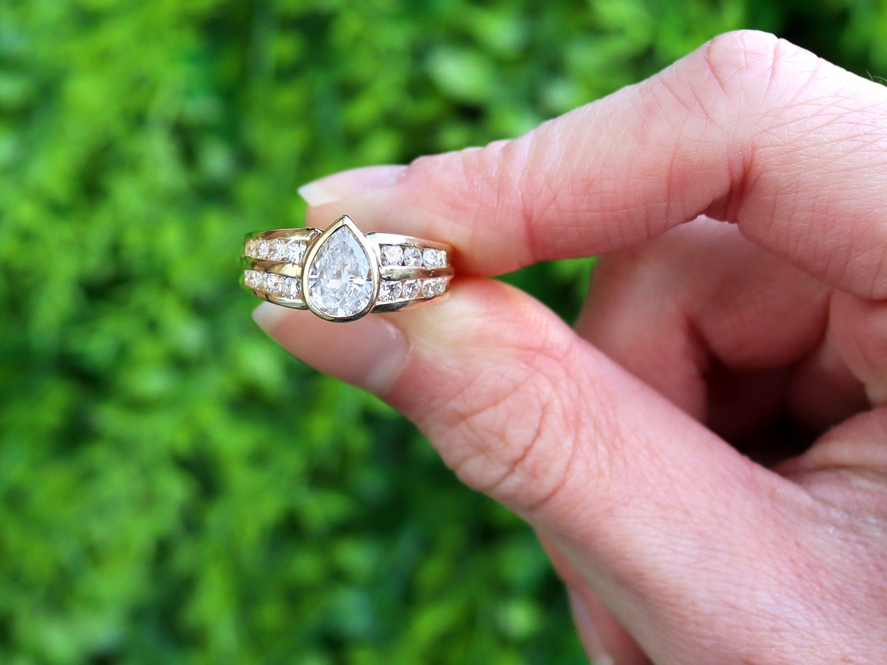 A stunning, fine and impressive, vintage pear cut diamond and 18 karat yellow gold solitaire ring: part of our vintage jewelry and jewelry collections.

This stunning, fine and impressive vintage ring has been crafted in 18k yellow gold.

The