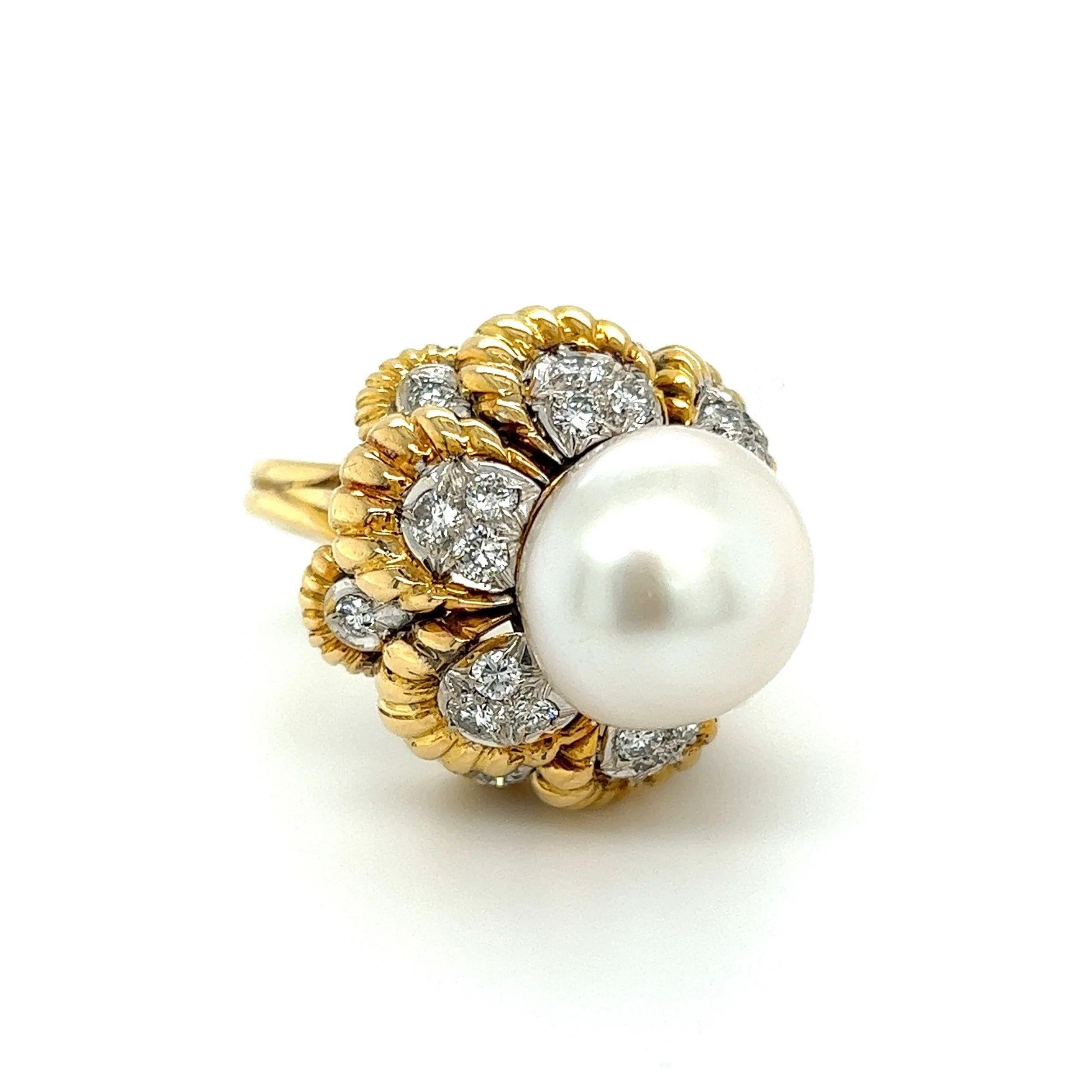 Simply Beautiful! Finely detailed Pearl and Diamond 18K Gold Cocktail Ring. Centering a securely nestled 14.3mm Pearl, artfully surrounded by Diamonds, weighing approx. 1.45 total carat weight. Approx. Dimensions 1.60” l x 0.96” w x 0.92” h. Hand