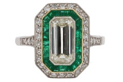Vintage 1.45 Carat Emerald Cut Diamond & Emerald Engagement Ring