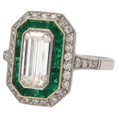 Bague de fiançailles vintage avec diamant taille émeraude de 1,45 carat et émeraude