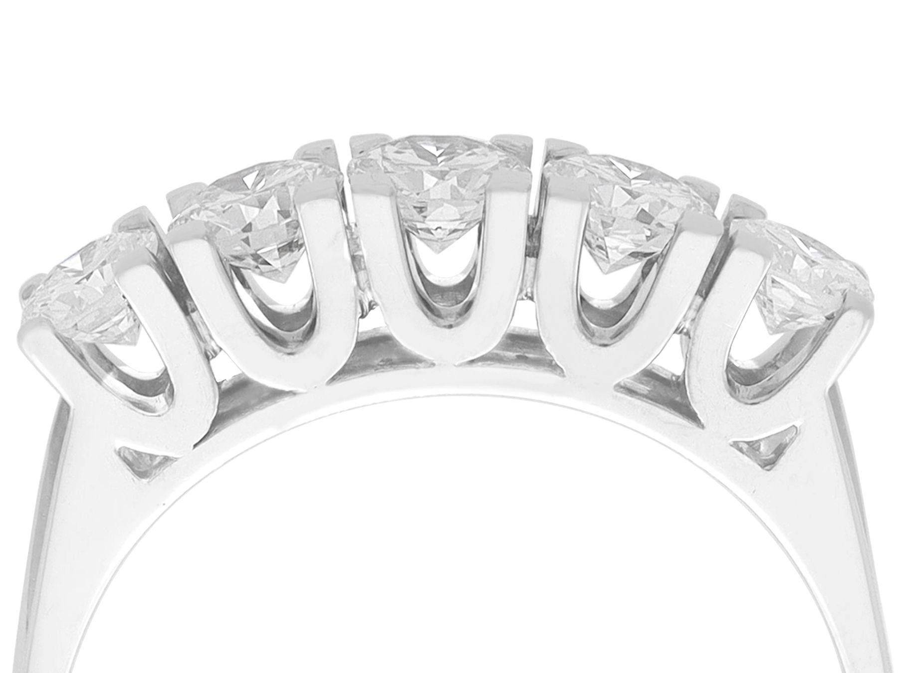 A stunning, fine and impressive 1.46 diamond and 18 karat white gold five stone ring; part of our diverse vintage jewelry and estate jewelry collections.

This fine and impressive vintage five stone diamond ring has been crafted in 18k white