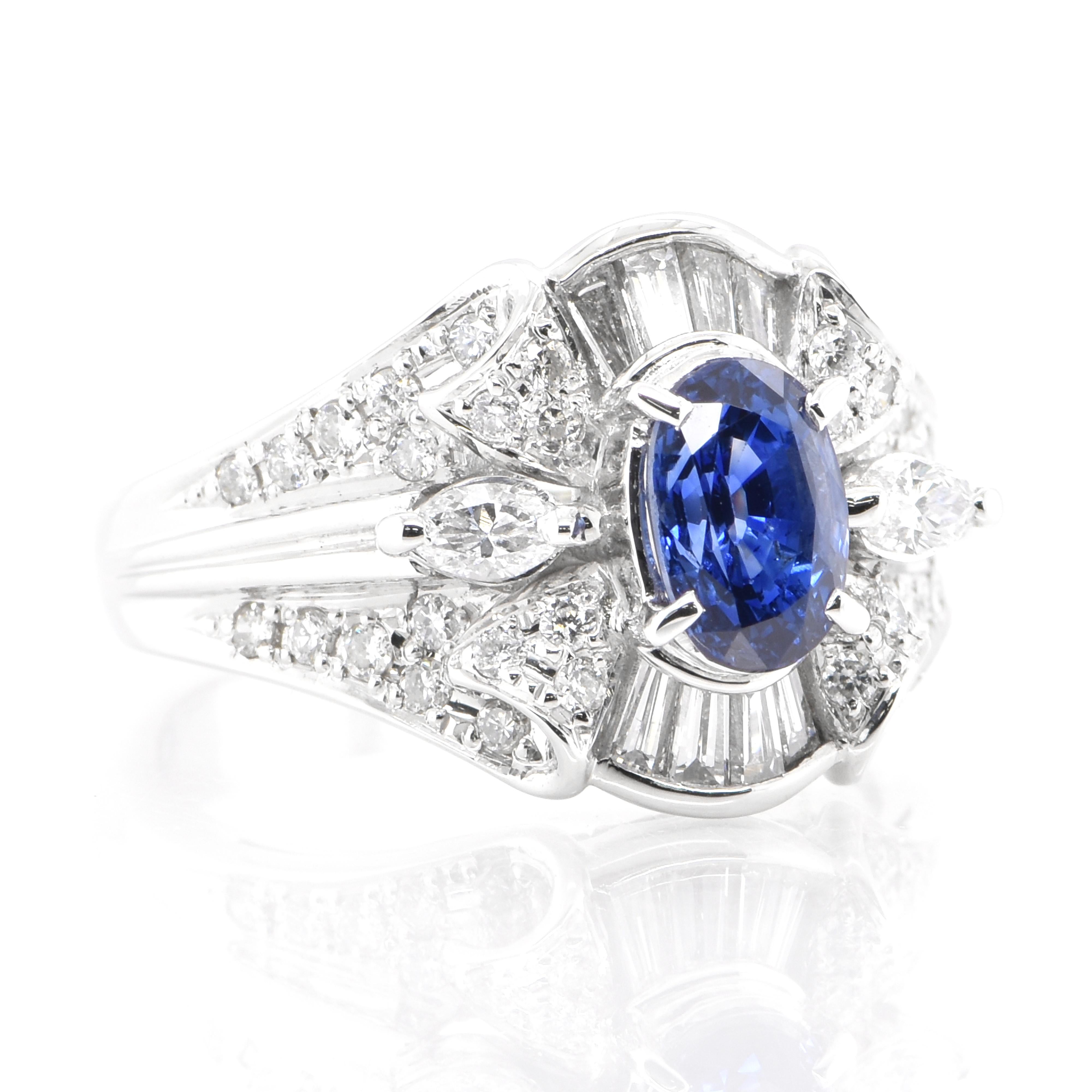 Modern Vintage 1.46 Carat Natural Blue Sapphire and Diamond Ring Made in Platinum For Sale