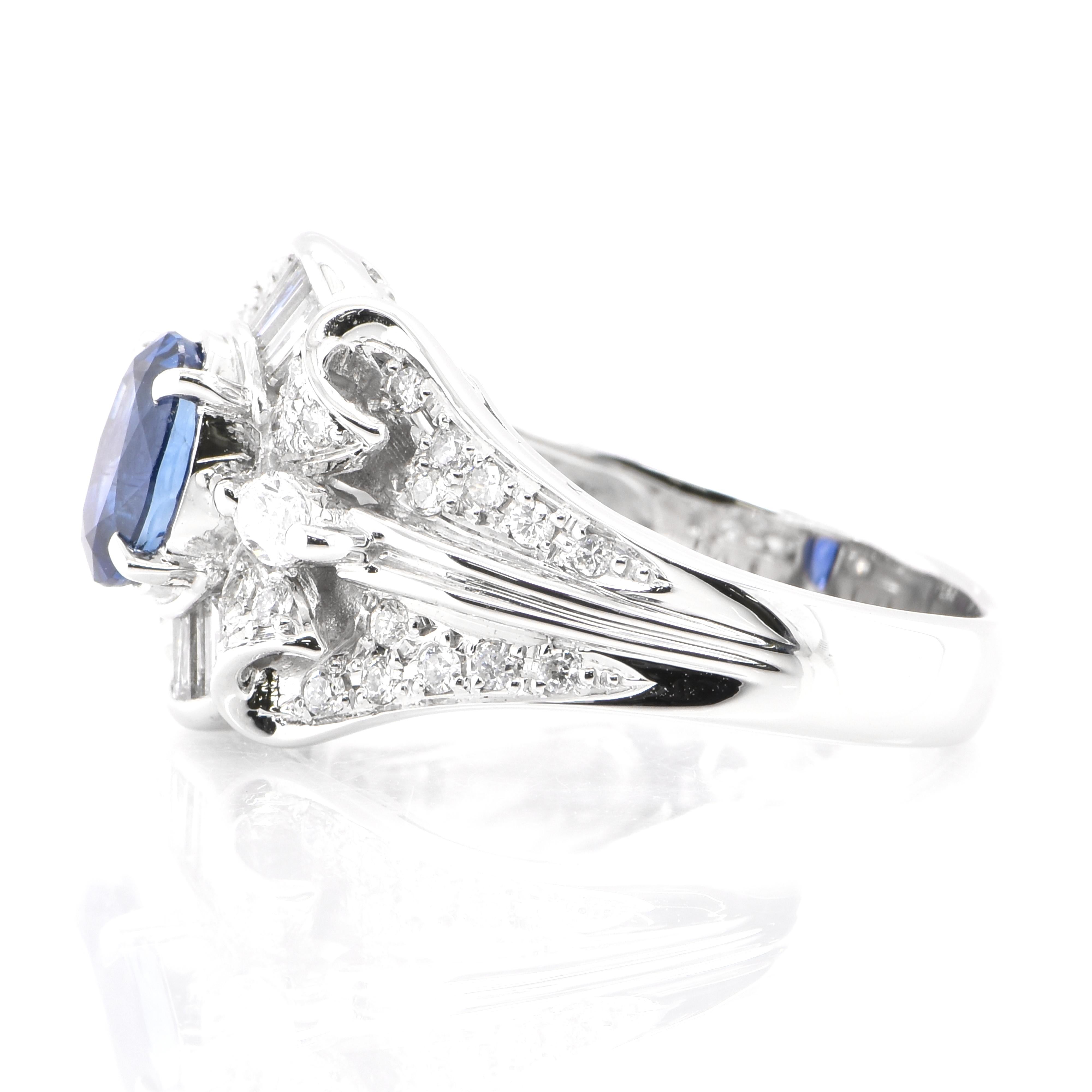 Oval Cut Vintage 1.46 Carat Natural Blue Sapphire and Diamond Ring Made in Platinum For Sale