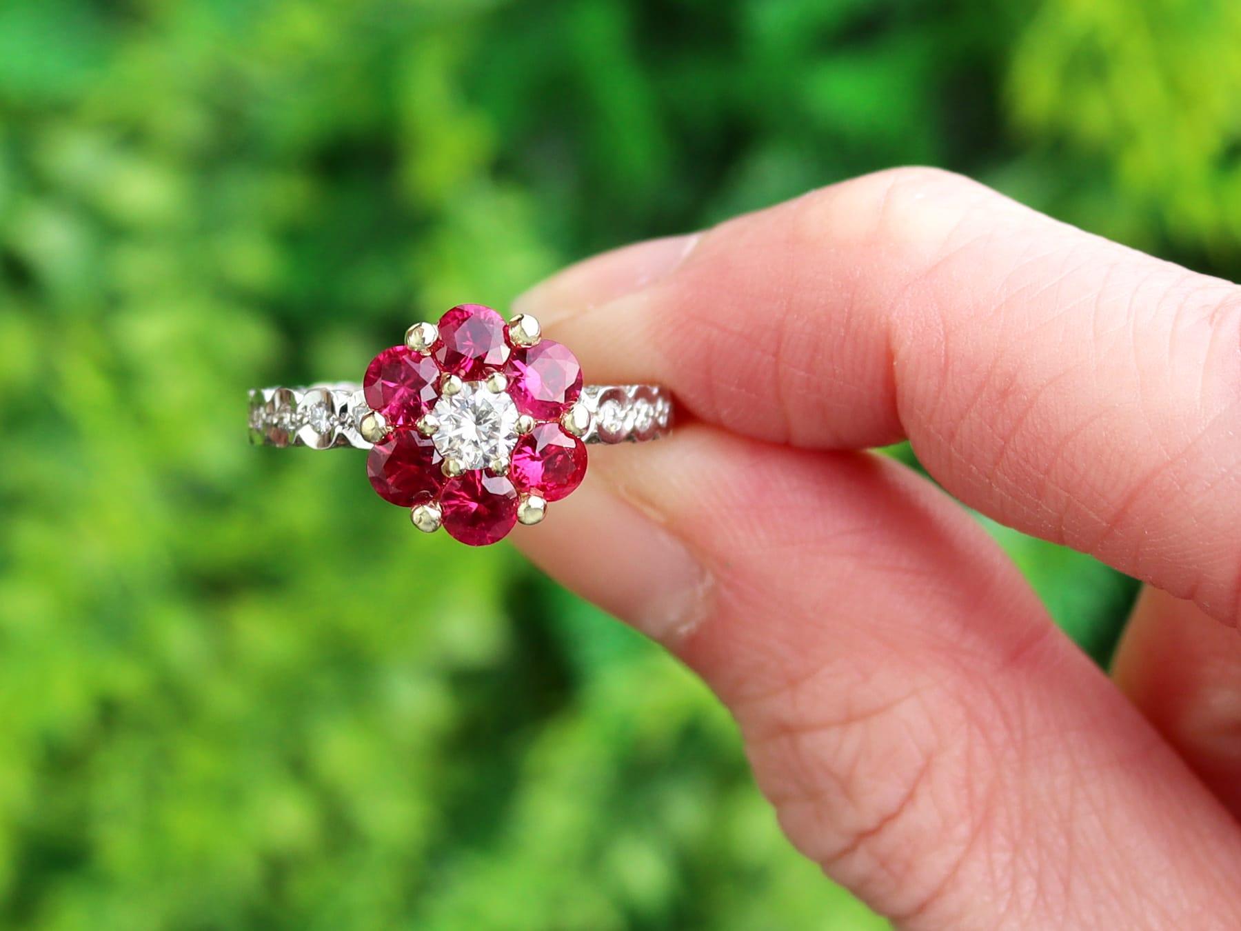 A fine and impressive vintage 1.46 carat ruby and 1.88 carat diamond, 18 karat white gold and 18k yellow gold set cluster ring; part of our diverse collection of vintage jewelry.

This fine and impressive vintage ring has been crafted in 18k white
