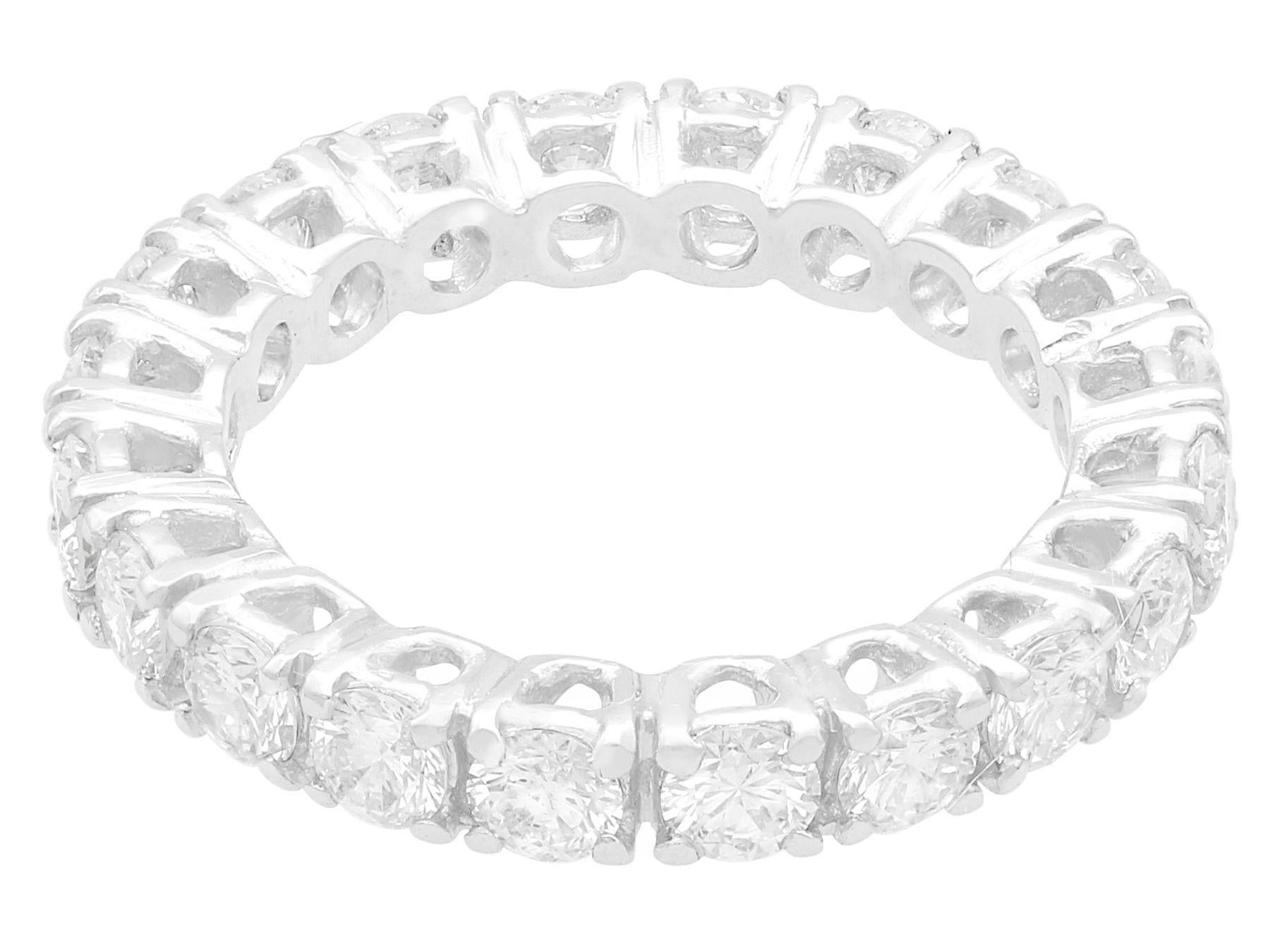 A stunning, fine and impressive vintage 1980s 1.47 carat diamond and 18 karat white gold full eternity ring; part of our diverse diamond jewelry and estate jewelry collections

This stunning, fine and impressive vintage full diamond eternity ring