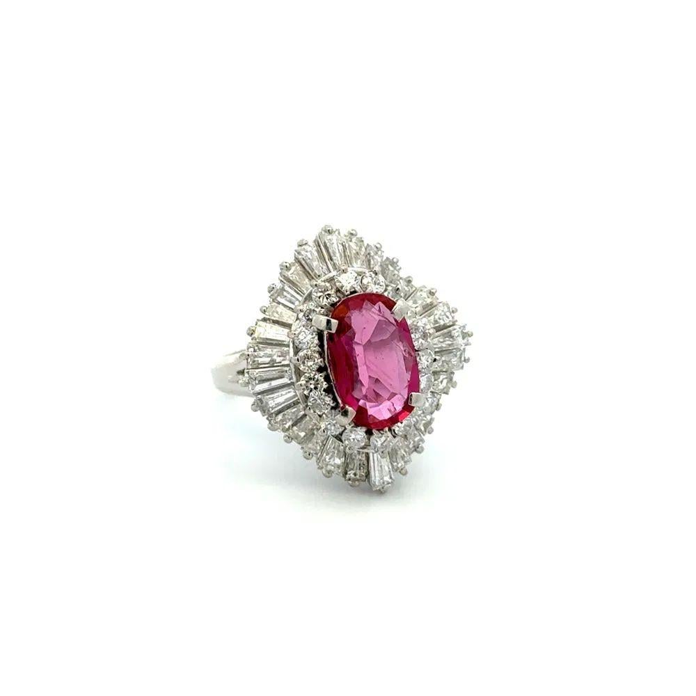 Simply Beautiful! Vintage Oval NO HEAT Ruby GIA and Baguette & RBC Diamond Platinum Cocktail Ring. Centering a securely nestled Hand set 1.48 Carat Oval NO HEAT GIA Ruby. Surrounded by Baguette and Round Brilliant Cut Diamonds, weighing approx.