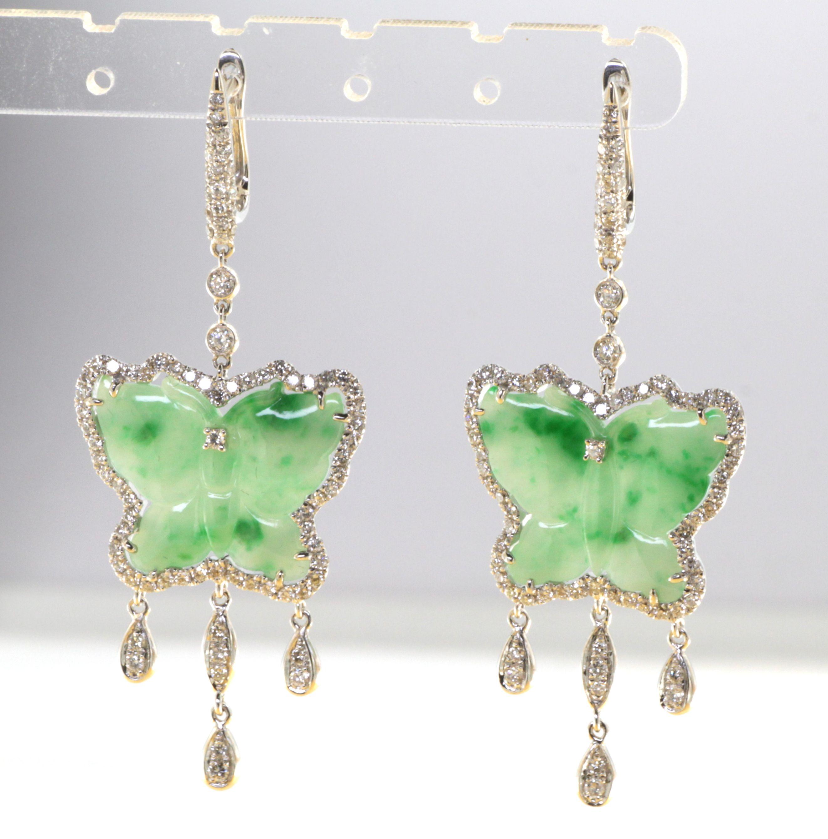 Introducing our captivating Vintage 14.85ct Butterfly Jade and Diamond Dangle Drop Earrings in 18k White Gold. These exquisite earrings exude timeless beauty and grace, combining the elegance of jade and the brilliance of diamonds.

The focal point