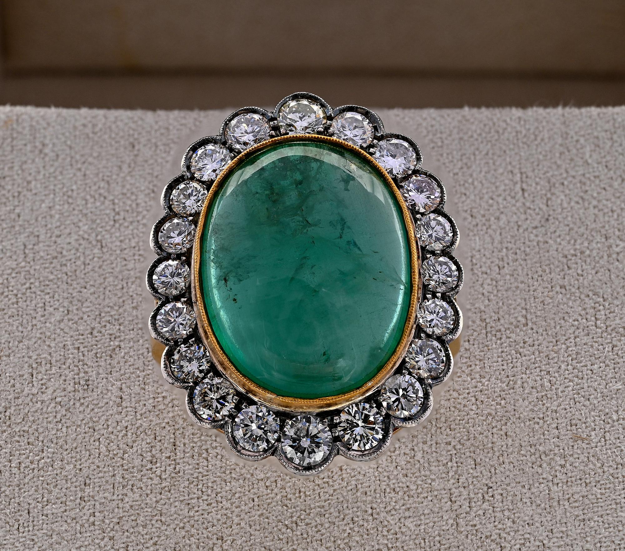 circa 1930/40
Hand constructed of solid 18 Kt gold with silver portions for the Diamonds housing
Large over sized oval shape with an amazing impact to the viewer
Centrally set with an antique oval cabochon cut Emerald – 14.90 Ct (17.96 x 13.79 mm.)