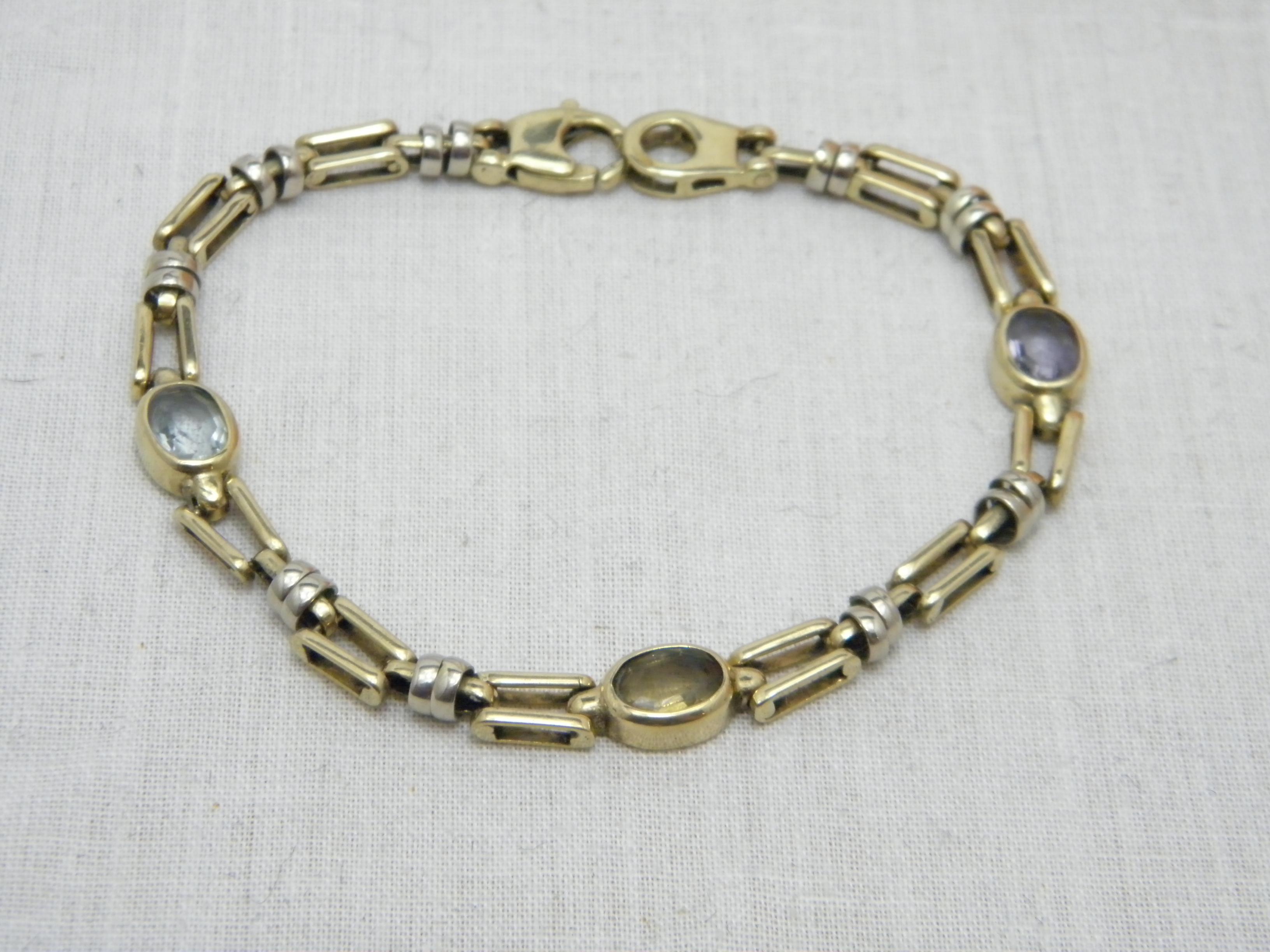If you have landed on this page then you have an eye for beauty.

On offer is this gorgeous

14CT HEAVY GOLD AMETHYST CITRINE AQUAMARINE BRACELET

DETAILS
Material: Solid 14ct (585/000) yellow and white gold
Gemstones: Lovely oval cut amethyst,