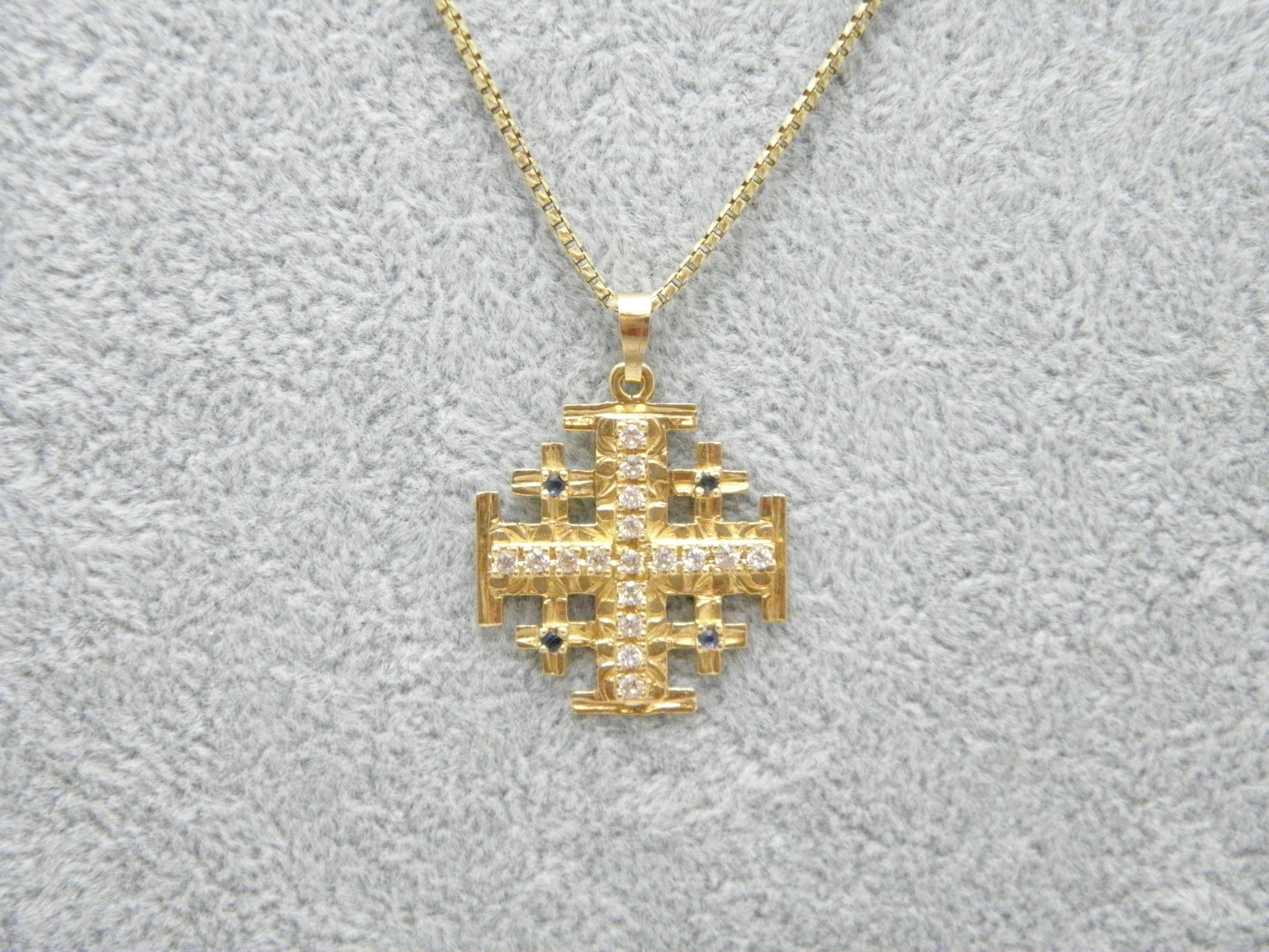 If you have landed on this page then you have an eye for beauty.

On offer is this gorgeous

14CT GOLD HEAVY SAPPHIRE SET JERUSALEM CROSS PENDANT NECKLACE

PENDANT DESCRIPTION
DETAILS
Material: Solid 14ct (585/000) yellow gold
Style: Multi prong