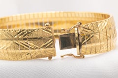 Vintage 14k Yellow Gold 14.5mm Omega Textured Flex Bangle