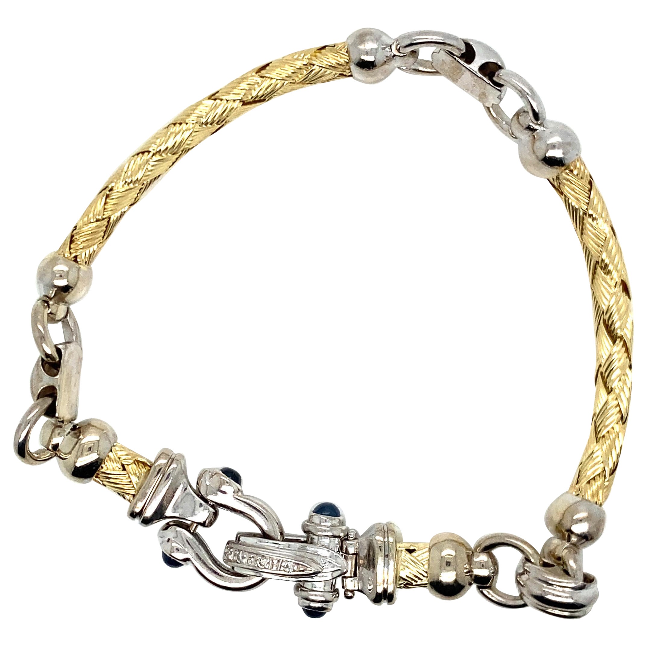 Pulsera vintage de eslabones de oro de 14 quilates de 2 tonos entretejidos y cierre de herradura con diamantes en venta