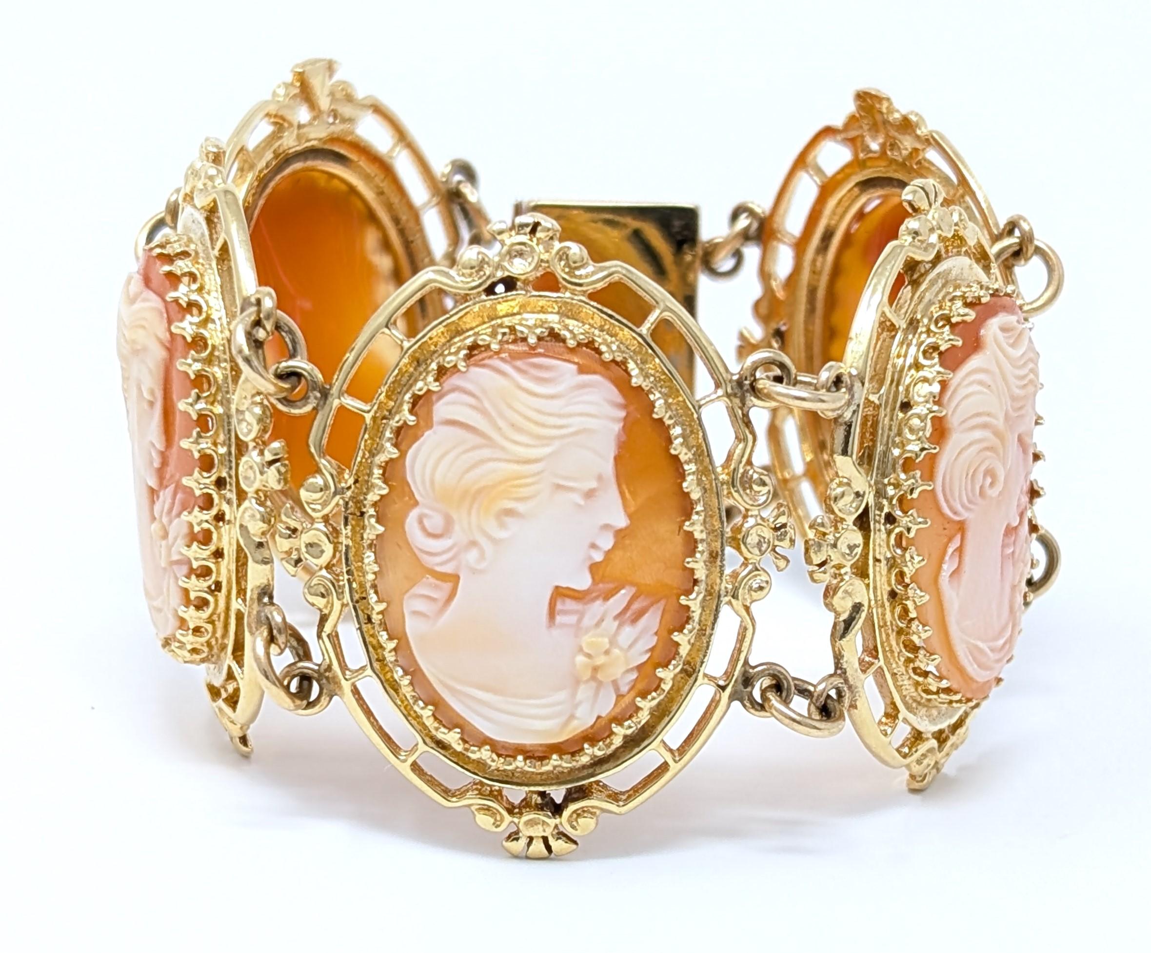 Vintage multi panel cameo bracelet, created in solid 14k yellow gold. Features 5 right facing carved shell cameos in detailed frames and is stamped 