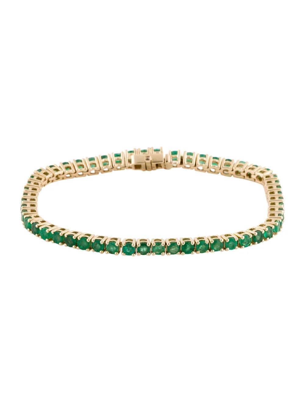 Elevate your jewelry collection with this exquisite 14K Yellow Gold Emerald Link Bracelet, adorned with a stunning 5.10 carat Round Modified Brilliant Emerald. Crafted with precision and attention to detail, this bracelet exudes elegance and