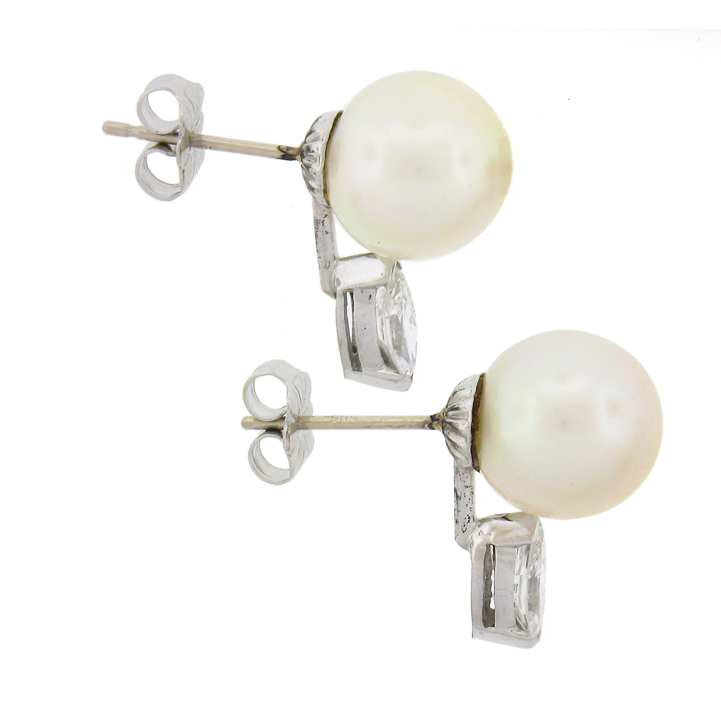 Taille ronde Clous d'oreilles vintage en or 14 carats, perles de culture de 10 mm et diamants de 0,65 carat en vente