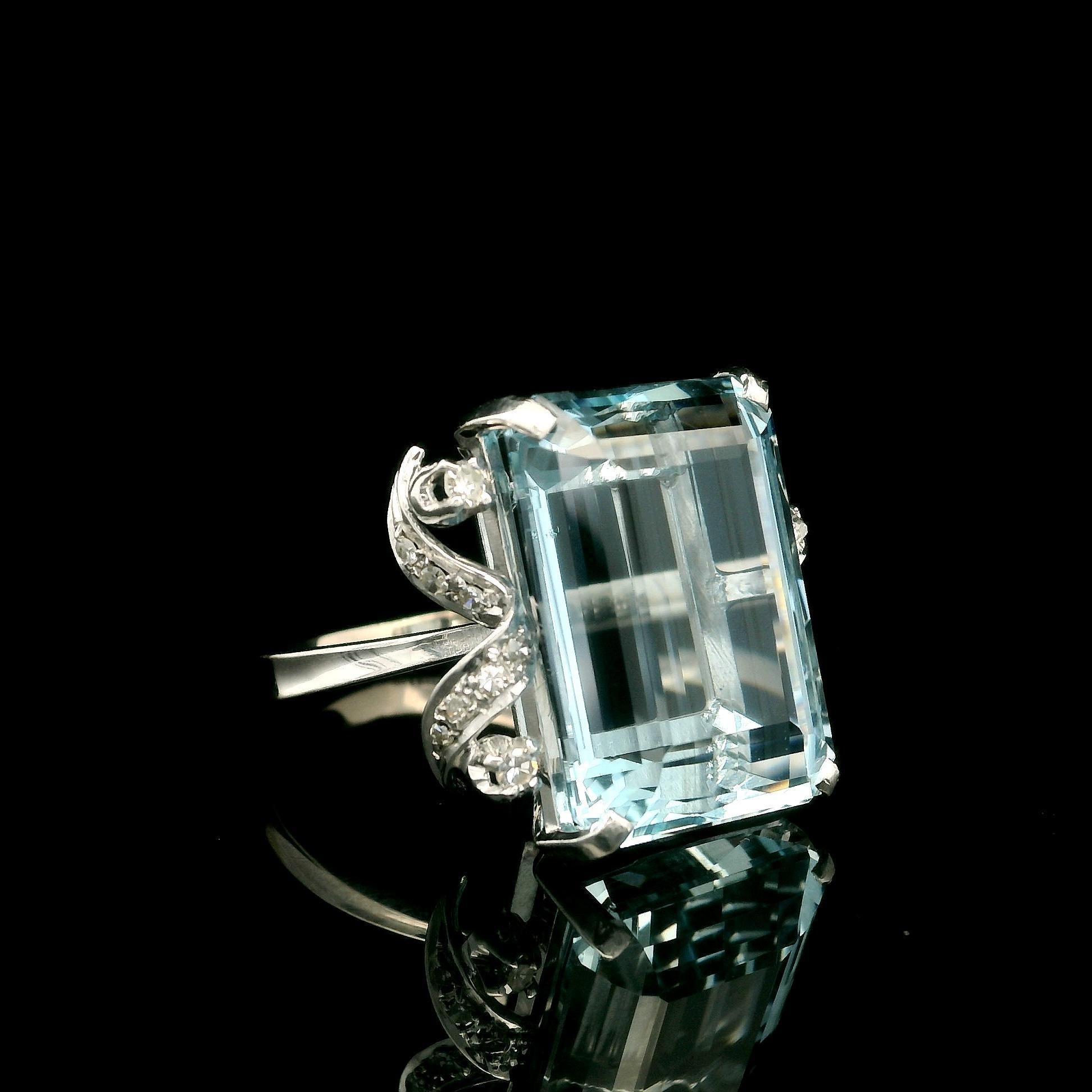 --Stone(s):--
(1) Natural Genuine Aquamarine - Emerald Cut - Prong Set - Clean Lively Classy Gorgeous Blue Color - 18.7x13.6mm - 18.3ct (approx.)
(17) Natural Genuine Diamonds - Old Single Cut - Prong & Pave Set - Nice Brilliant White
