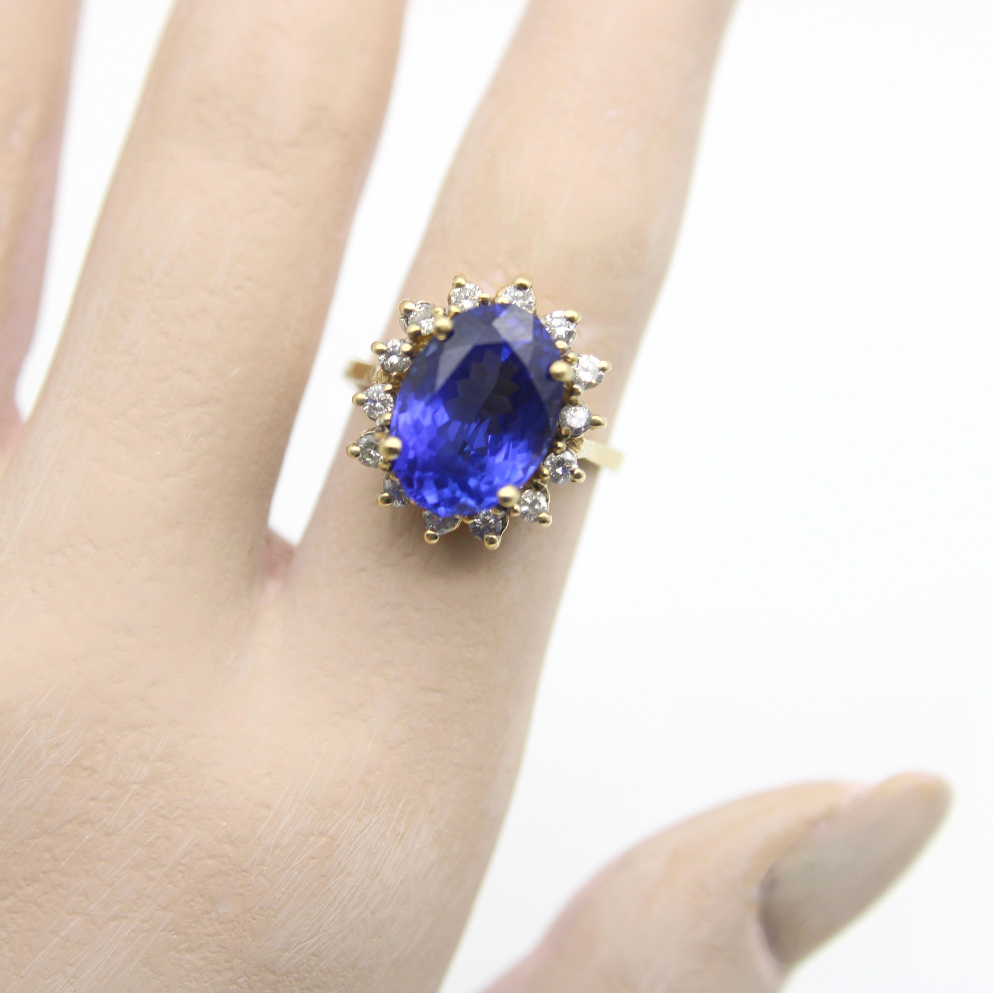 Contemporary Vintage 14K Gold 7 Carat Tanzanite and Diamond Halo Ring by LeVian For Sale
