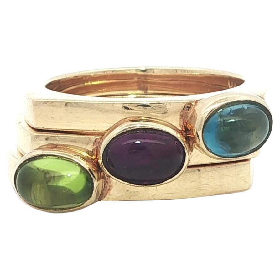 Vintage 14k Gold Amethyst Blue Topaz 
Peridot 3 Stackable Puzzle Bands Rings For Sale