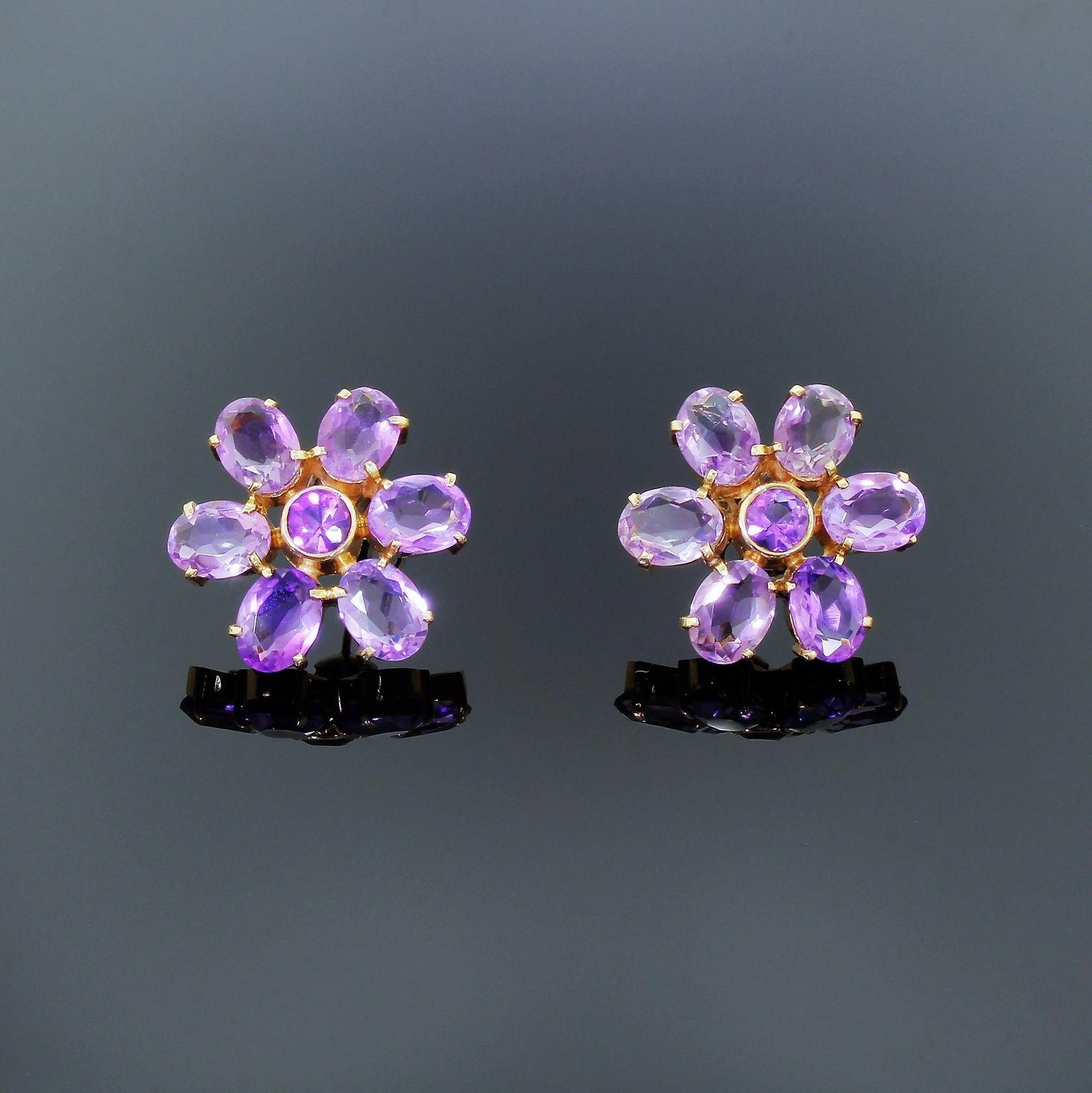 Beautiful 14k gold Amethyst cluster floral earrings, perfect for any season.
These are in beautiful condition, the stones glint and sparkle with the smallest movement. Very eye catching.
The earrings consist of six 8x6mm oval amethysts per earring