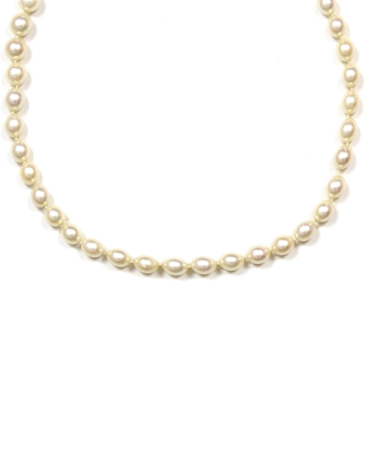 14k Gold and Cultured Pearl Necklace with Opal Pendant 

Unknown origins
Color: Gold
Materials: 14k Gold, Opal, Pearl
Hallmarks: 