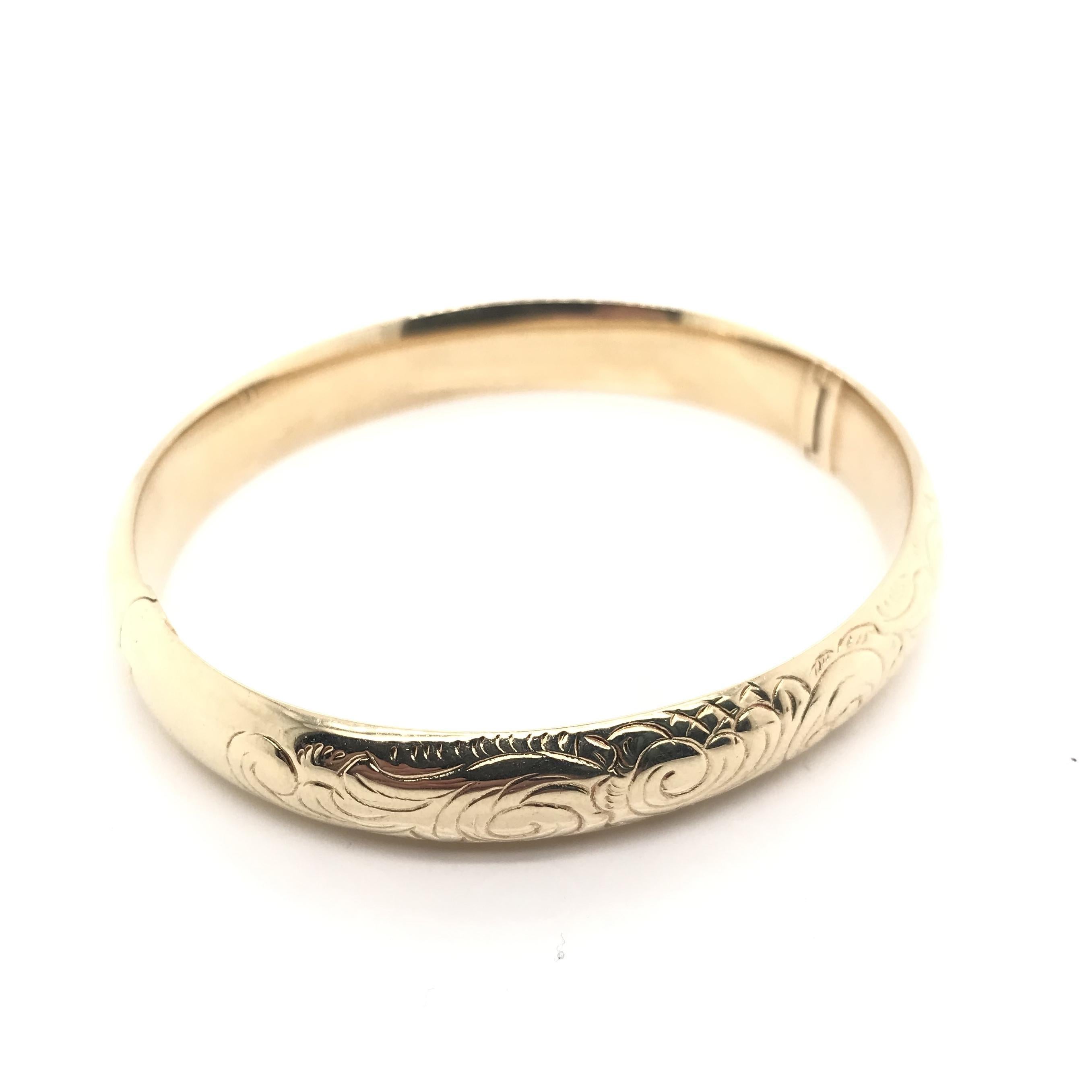 Gold bangle bracelets have been a jewelry staple from the very beginning but we estimate this piece was crafted sometime after the Mid Century design period (1970-1990). The bangle’s hallmarks suggest it is most likely European in origin and is 14K