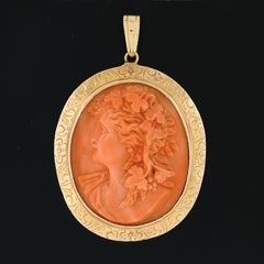 Vintage 14k Gold Bezel Oval Carved Coral Cameo w/ Hand Engraved Frame Pendant