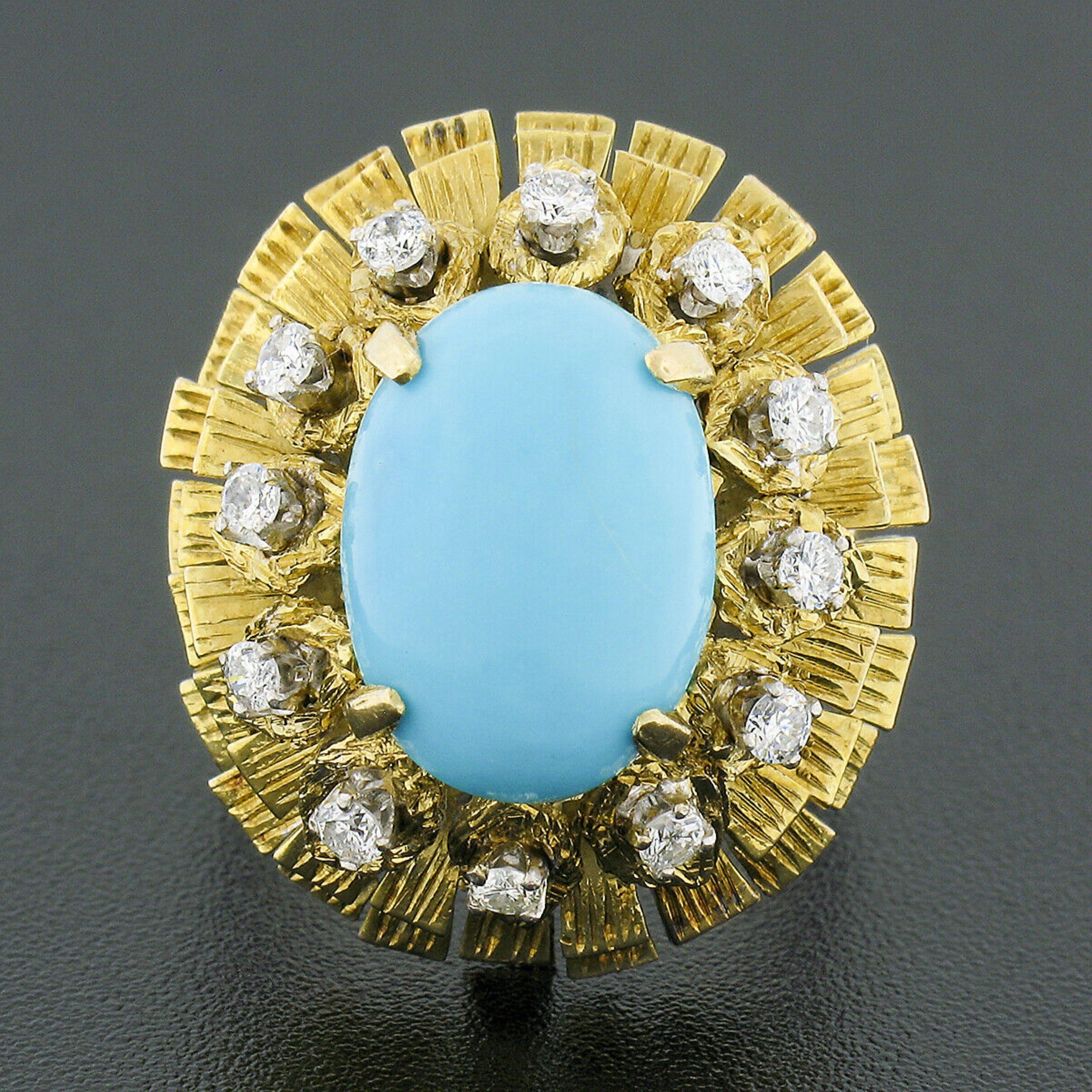You are looking at a beautiful vintage ring that was crafted from solid 14k yellow gold featuring a genuine turquoise solitaire neatly set at the top of an elegantly layered and textured finish design. The very fine oval cabochon cut turquoise has a