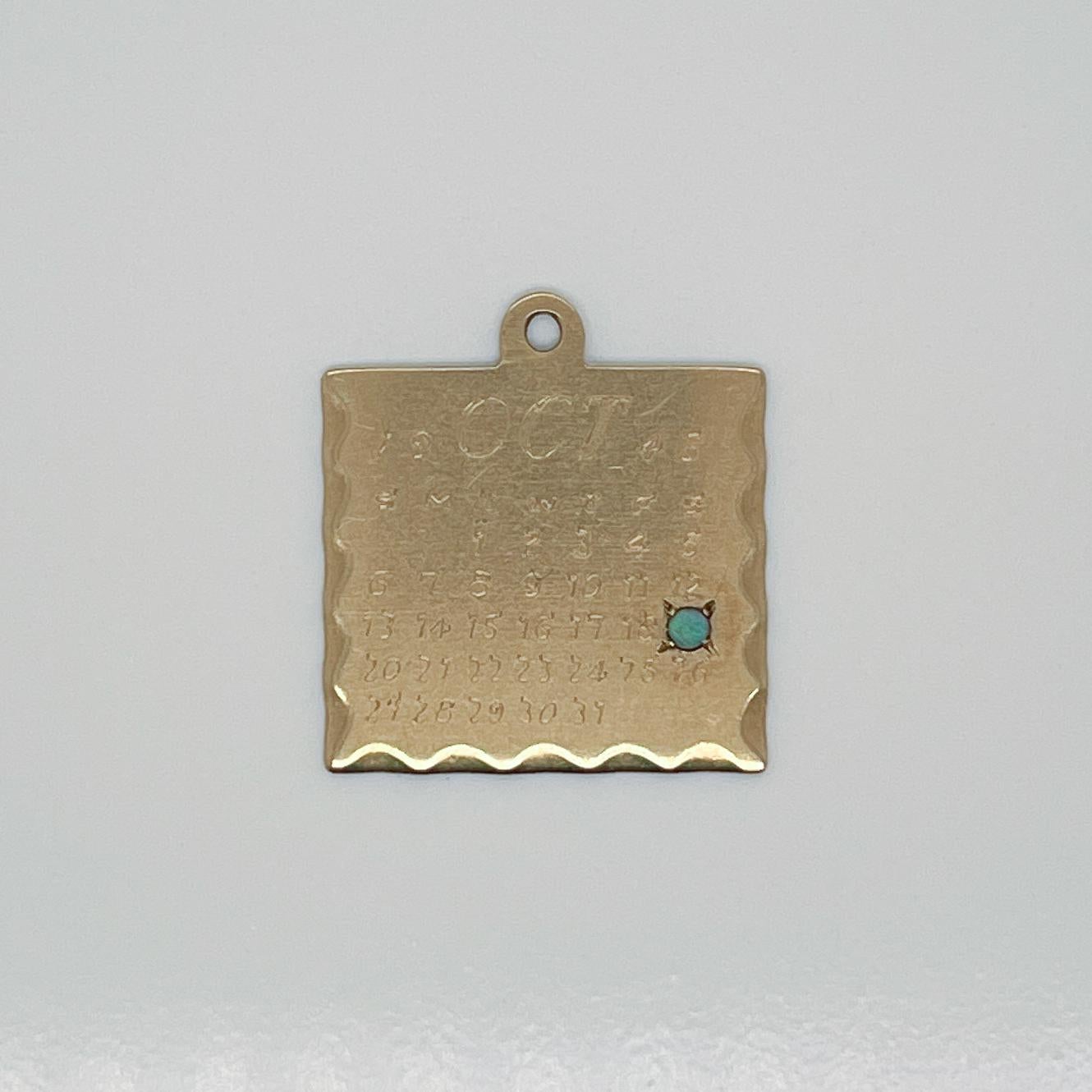 gold calendar charm