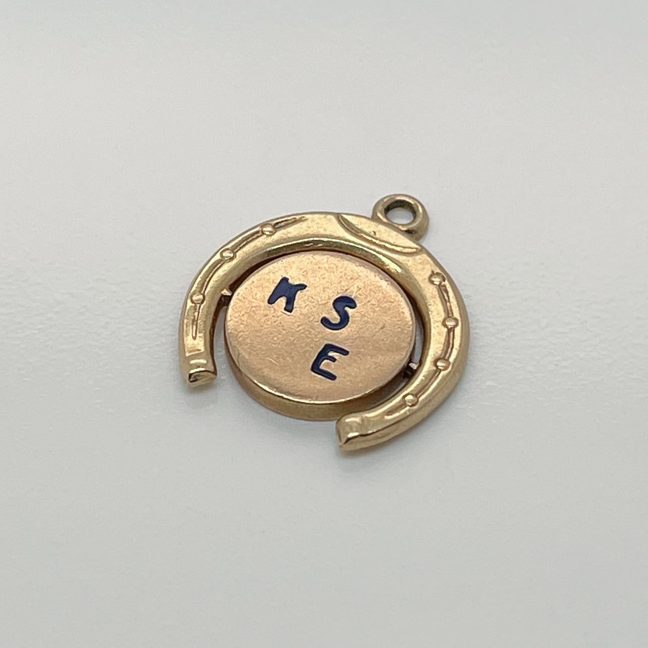 Vintage 14K Gold Charm of a Spinning 