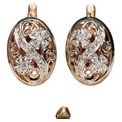 Boucle d'oreille vintage en or 14k Circa 1960 décorée de diamants naturels