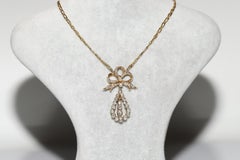 Vintage 14k Gold Circa 1970s Natural Diamond Decorated Bow Design Necklace