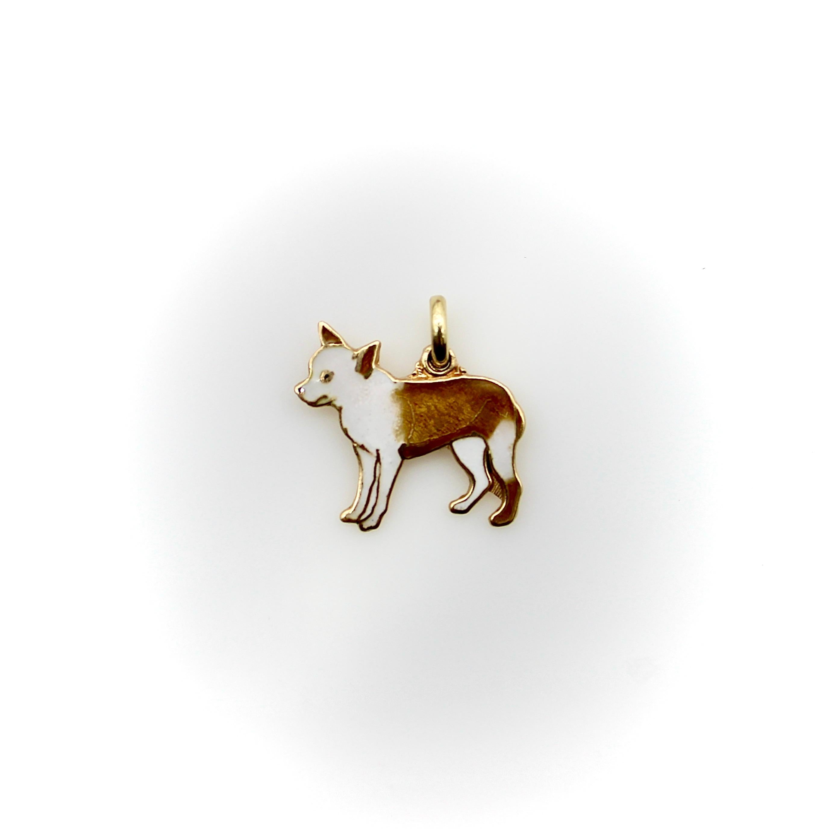 Made in 14k gold with enamel details, the two-toned white and tan chihuahua in this charm has a high forehead and long front legs. The charm does a great job expressing the chihuahuas timid but cute personality. Each charm is made to be breed