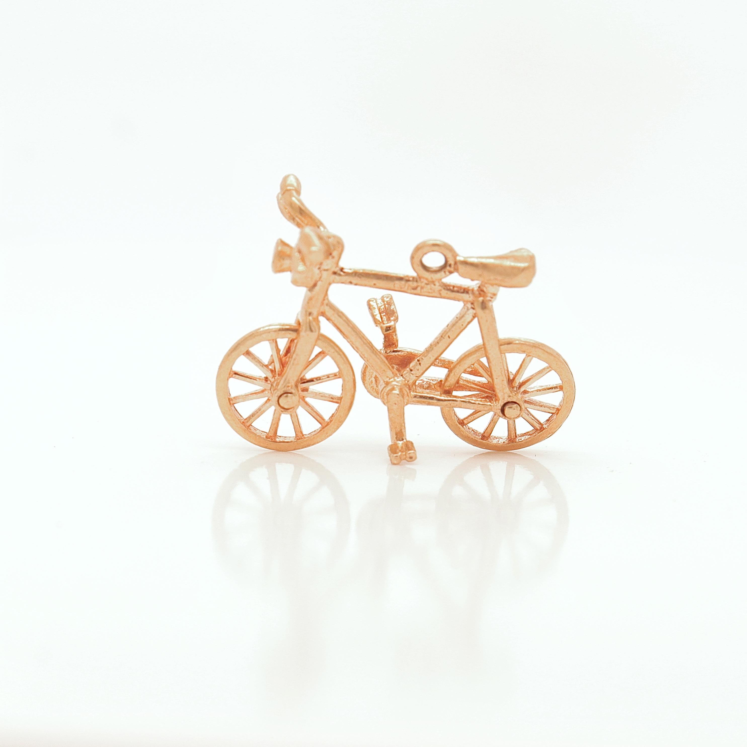 A fine vintage charm for a bracelet.

In 14 karat gold.

In the form of a bicycle.

Simply a great charm!

Date:
20th Century

Overall Condition:
It is in overall good, as-pictured, used estate condition with some fine & light surface scratches and