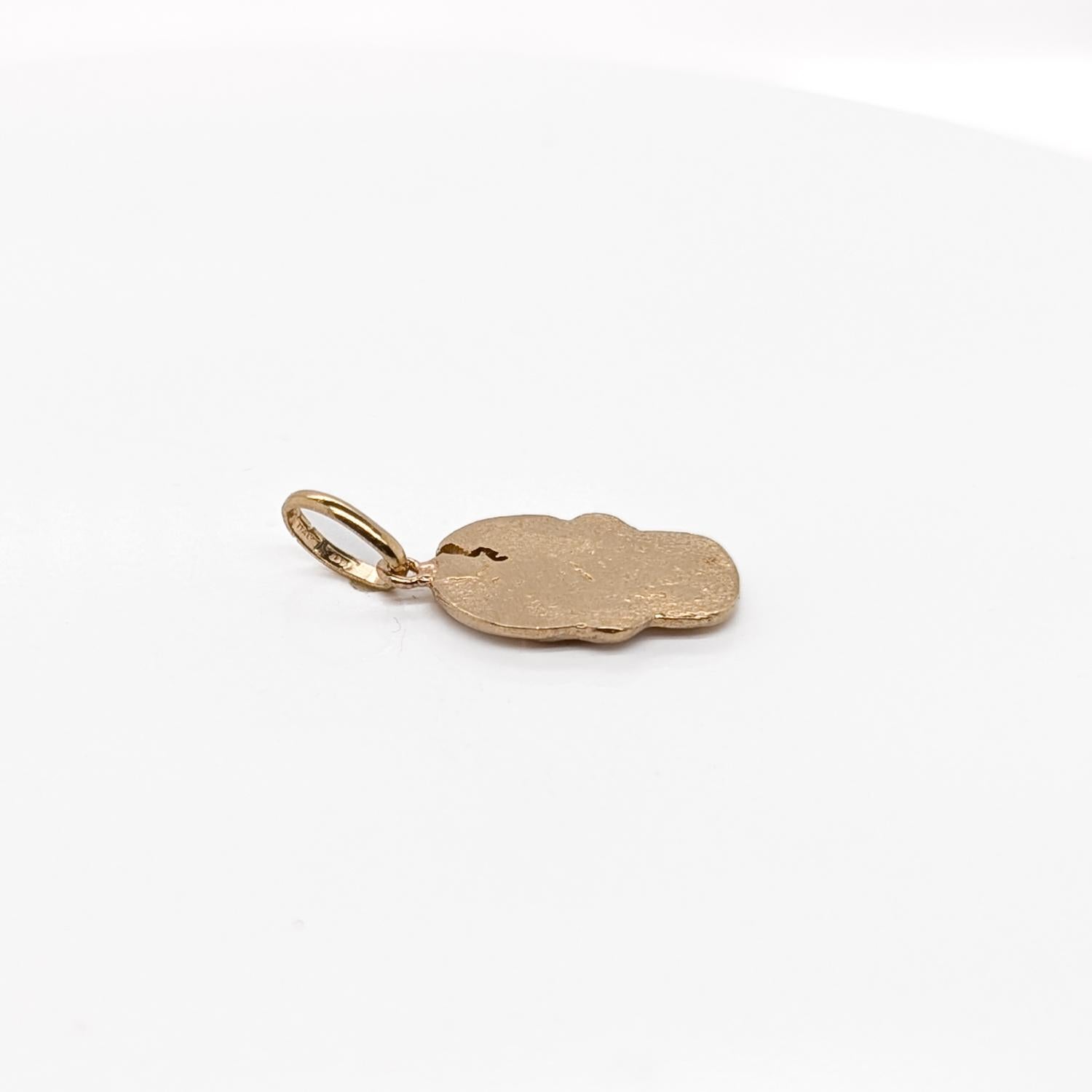Vintage 14K Gold Figural Cracked Skull Charm In Good Condition For Sale In Philadelphia, PA