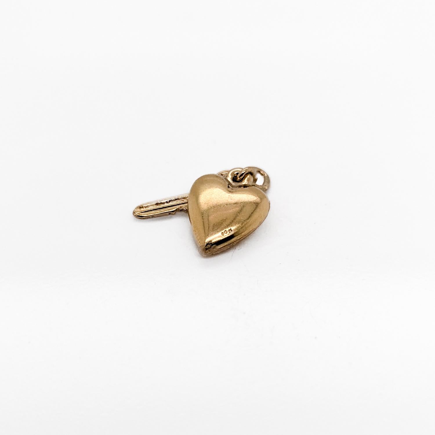 Modern Vintage 14K Gold Figural Key to the Heart Charm For Sale