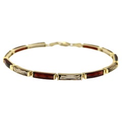 Armband aus 14 Karat Gold Granat und Rauchquarz