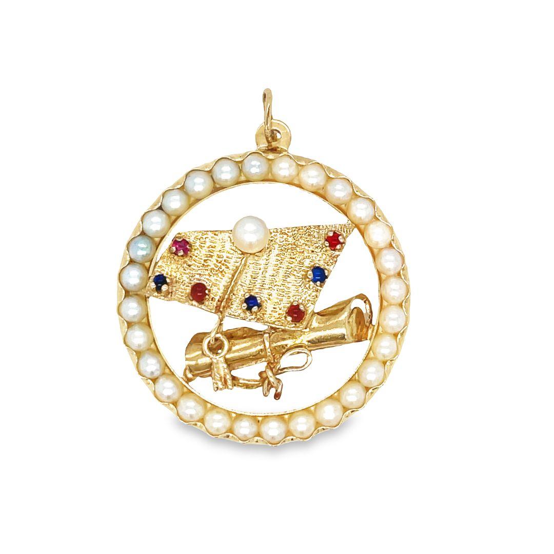Substantial in size and weight, this beautiful statement pendant features 14K yellow gold, multi-gem graduation cap centers upon a diploma. This graduation charm has been designed with multi-gems and (1) genuine cultured pearl.

The center is