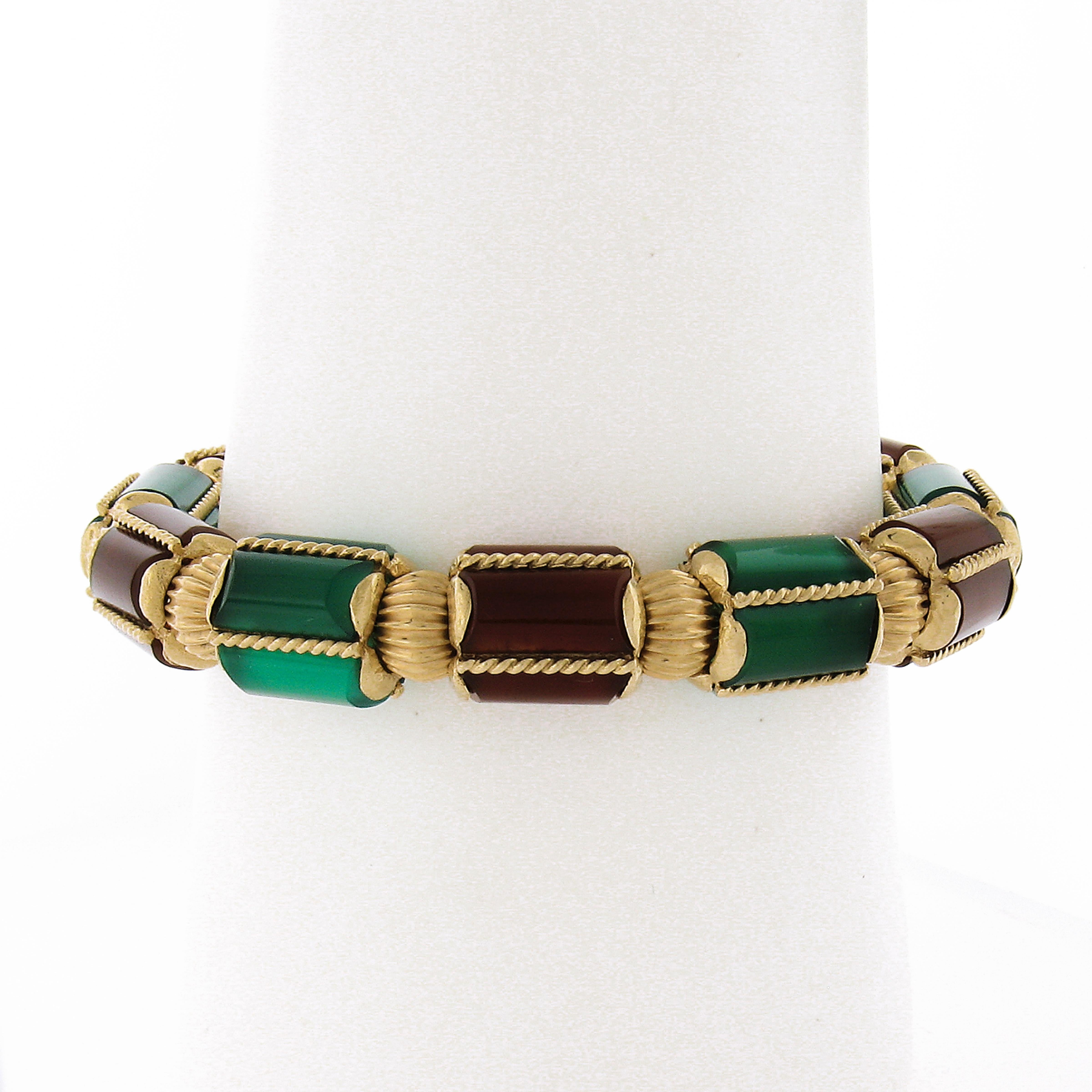 Here we have a gorgeous vintage rope link chain bracelet that was crafted from solid 14k yellow gold with two lovely tassels gently dangling at the ends accented with 2 carnelian beads measuring 10.1mm & 12.3mm. This beautiful bracelet features a