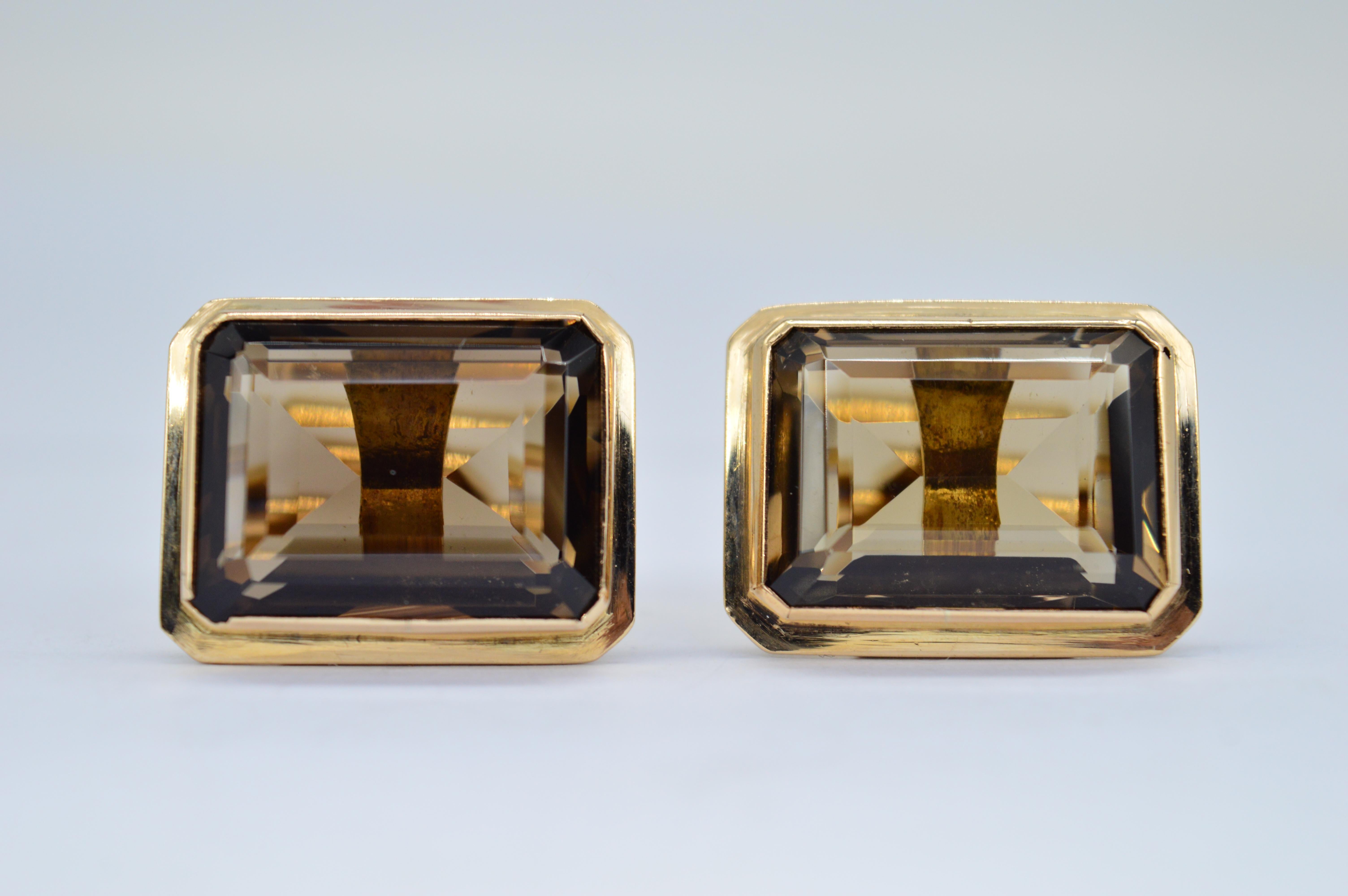 A set of vintage 14ct gold cufflinks made with smoky quartz

A statement set due to the oversized smoky quarts stones of flawless quality

19.74g

We have sold to the set of Hit shows like Peaky Blinders and Outlander as well as to Buckingham Palace