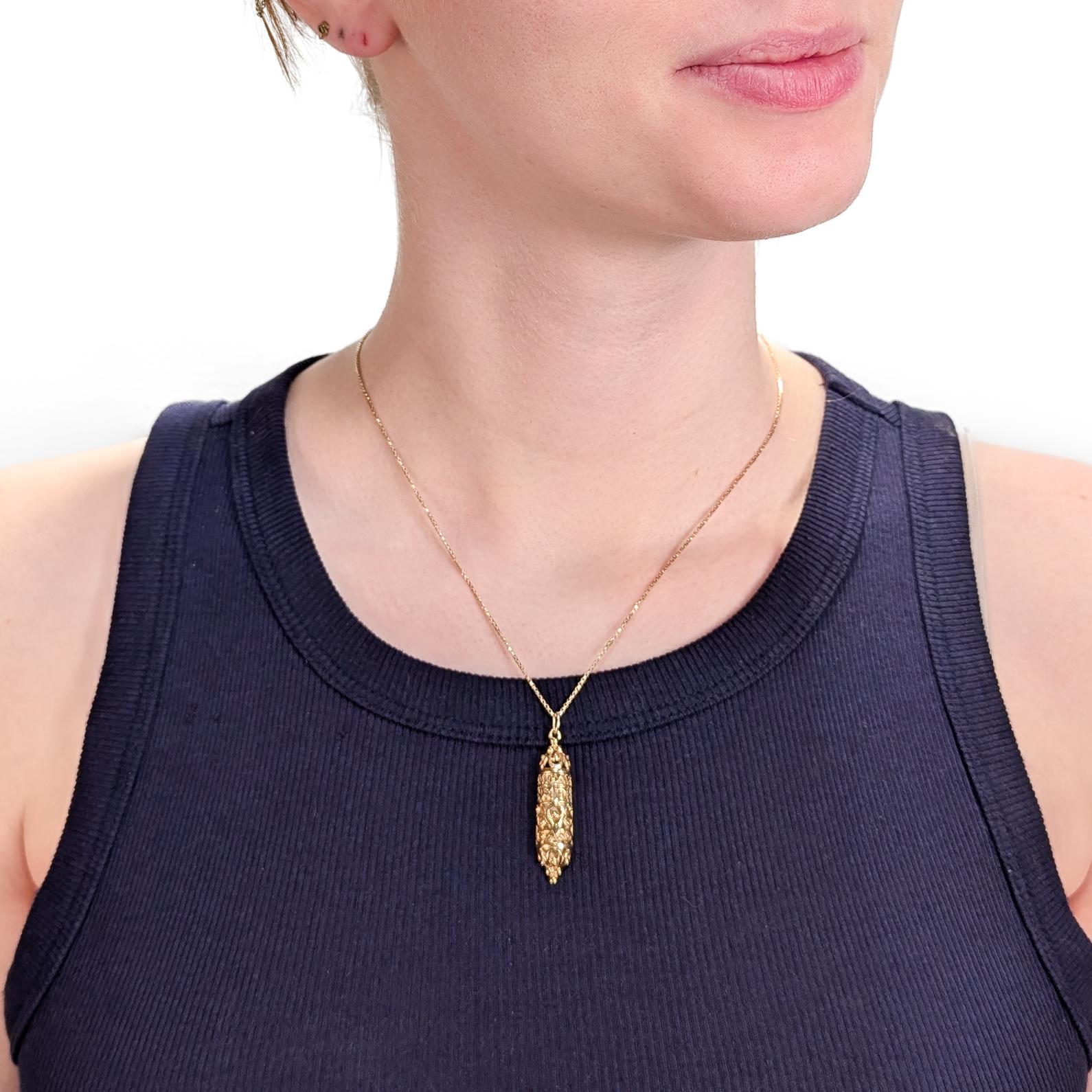 A fine Mezuzah charm for a bracelet or necklace.

In 14 karat yellow gold.

In the form of a miniature Mezuzah.

With an integral bail and jump ring.

Fully marked to the reverse. 

Simply a wonderful Judaica charm!

(Chain for display purposes and