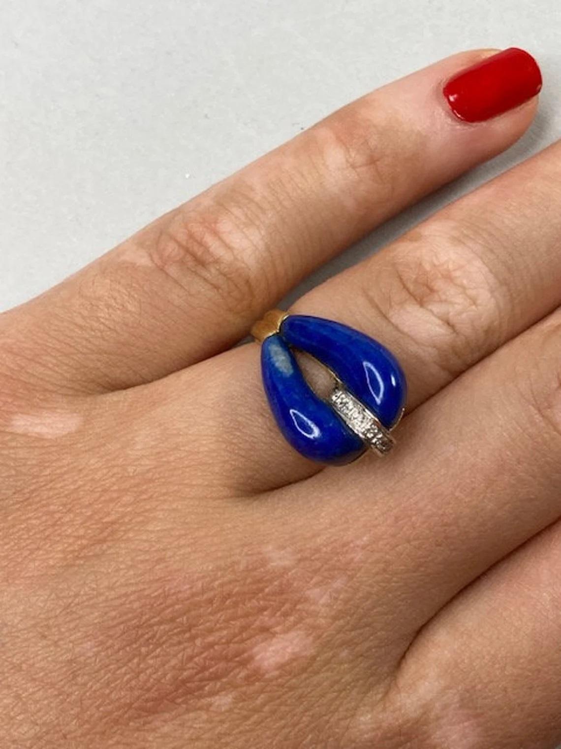 Vintage 14k Gold Lapis Lazuli Teardrop Ring with Diamonds, One-of-a-kind

This stunning teardrop lapis lazuli ring with a trail of sparkling diamonds is set in 14k yellow gold. This vintage piece is perfect for everyday wear or for a special