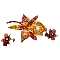 Ensemble vintage composé d'une broche et de boucles d'oreilles en forme de lys, en or 14 carats, datant des années 1980