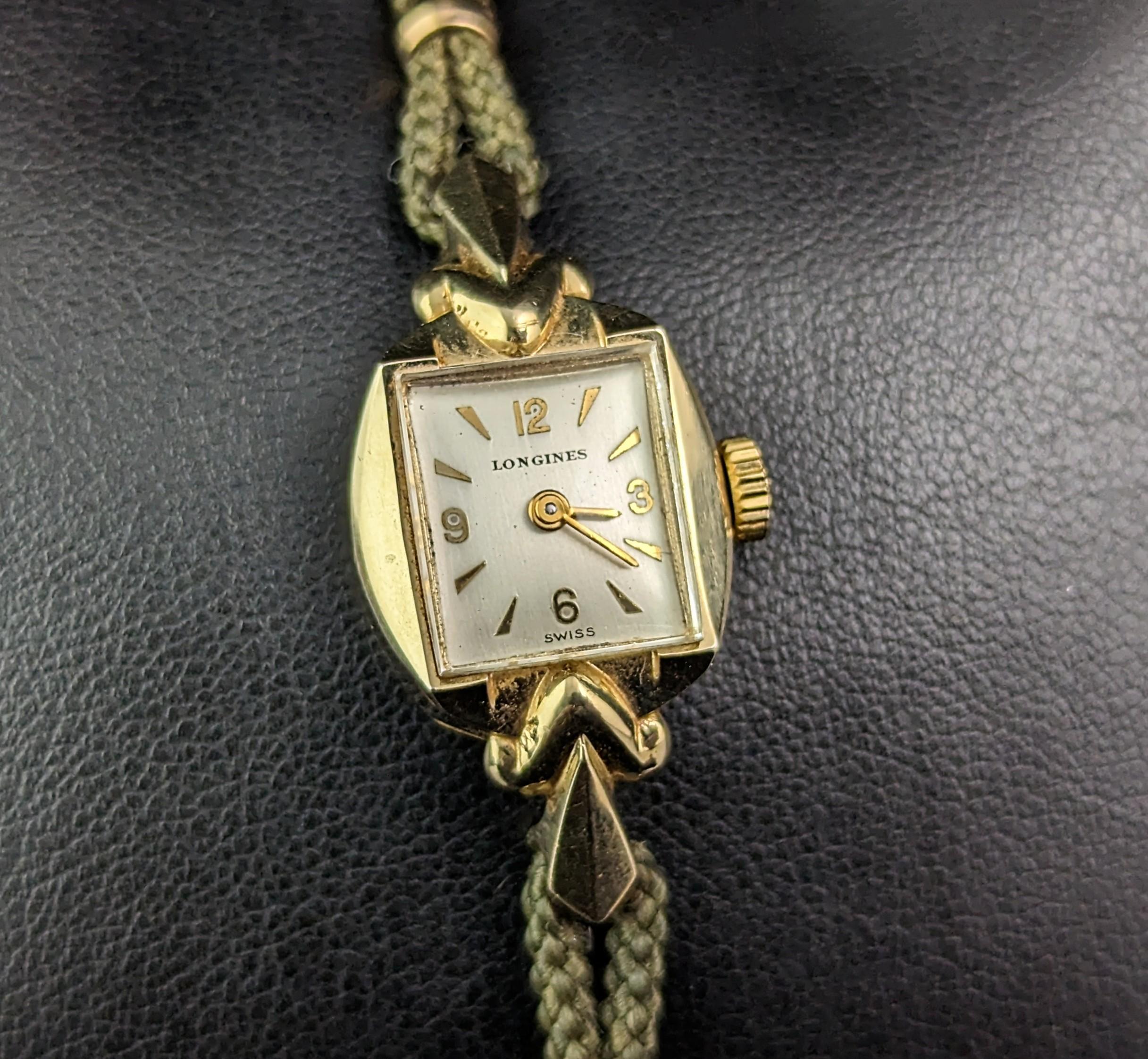 A gorgeous vintage 14ct gold ladies wristwatch.

It has a yellow gold case with a champagne tone dial with gold Arabic numerals and hands and a raised crystal.

Made by the renowned Longines the dial is marked Longines and the crown is branded.

The