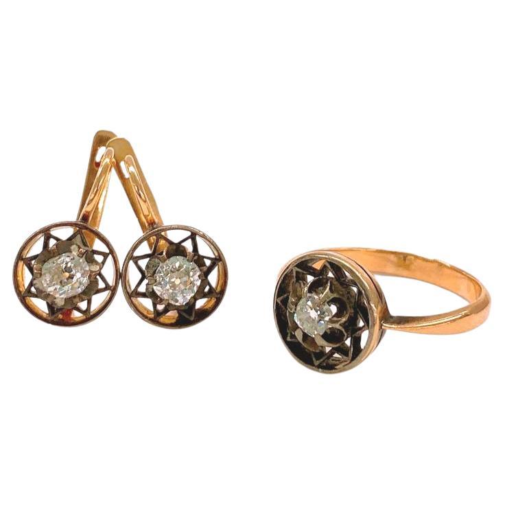 Vintage soviet era set of ring and earrings of 14k gold with old mine cut diamonds in open work style in a star designe with estimate diamond weight of 1.20 carats H colour white set dates back to the siviet unioun era 1945 hall marked 583 soviet