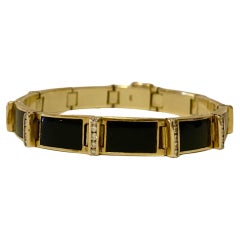 Pulsera vintage de oro de 14k con diamantes y ónix